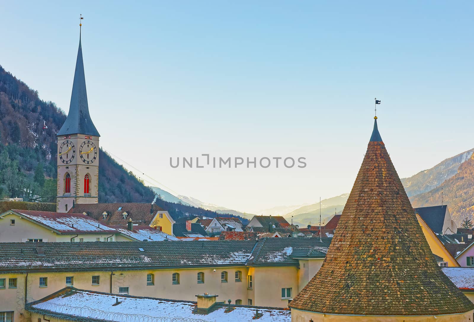 St Martin Church and Tower in Chur in the morning. Chur is the capital of canton Graubunden in Switzerland. It lies in the Alpine Grisonian Rhine valley. The city is the oldest town of Switzerland