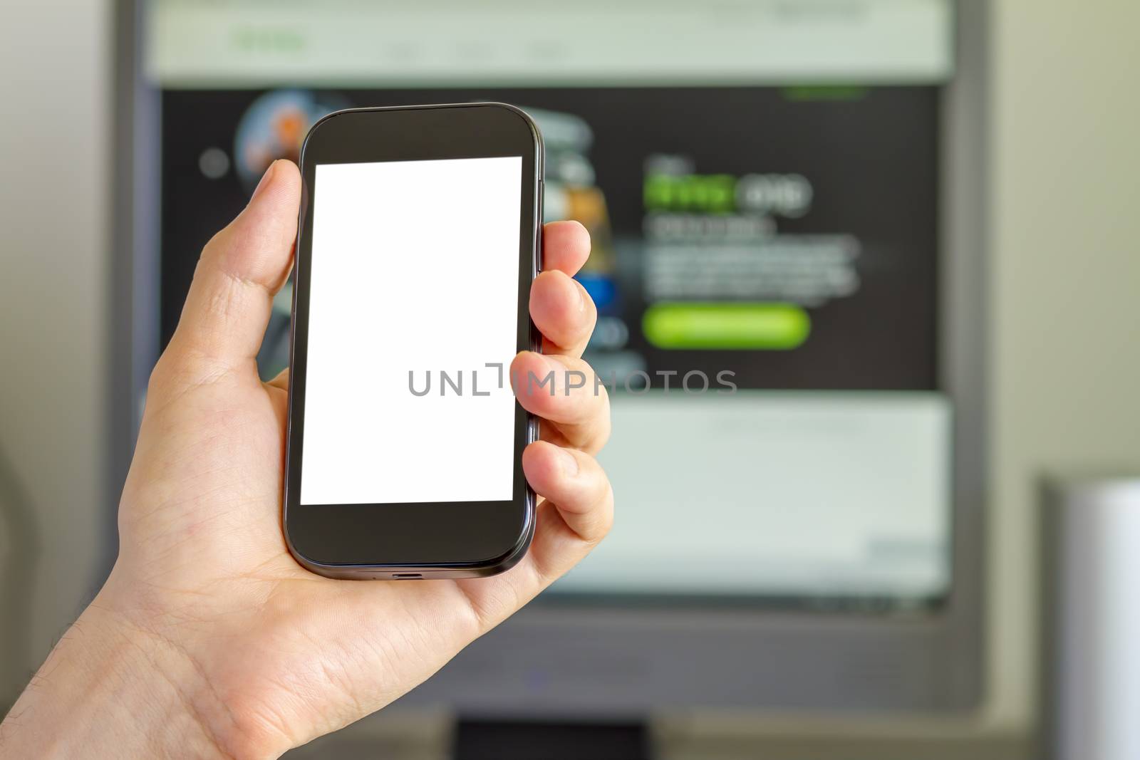 Closeup of Man's Hand holding a Smartphone in Office