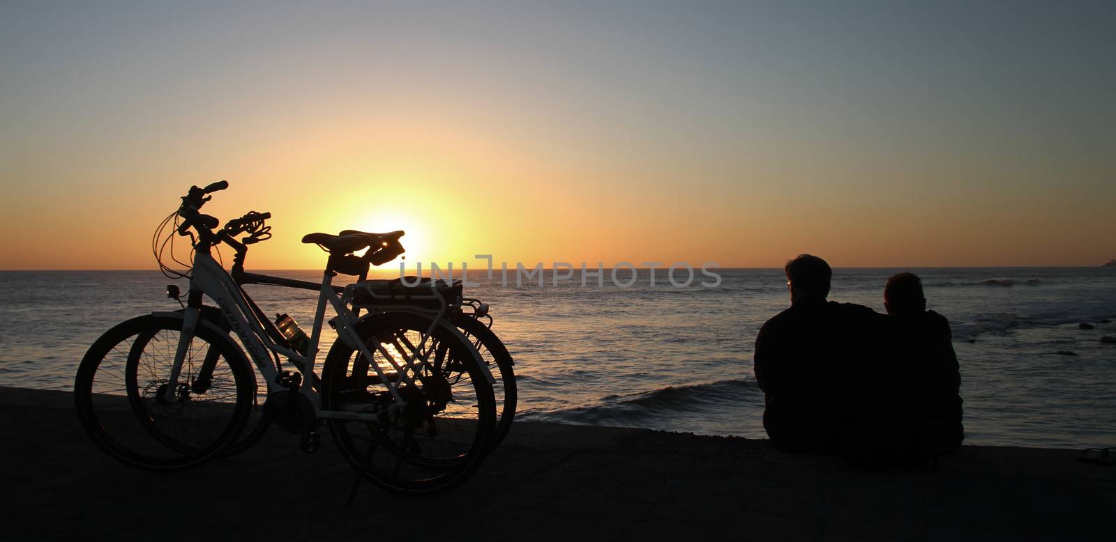 Two people two bikes and horizon by JRTBurr