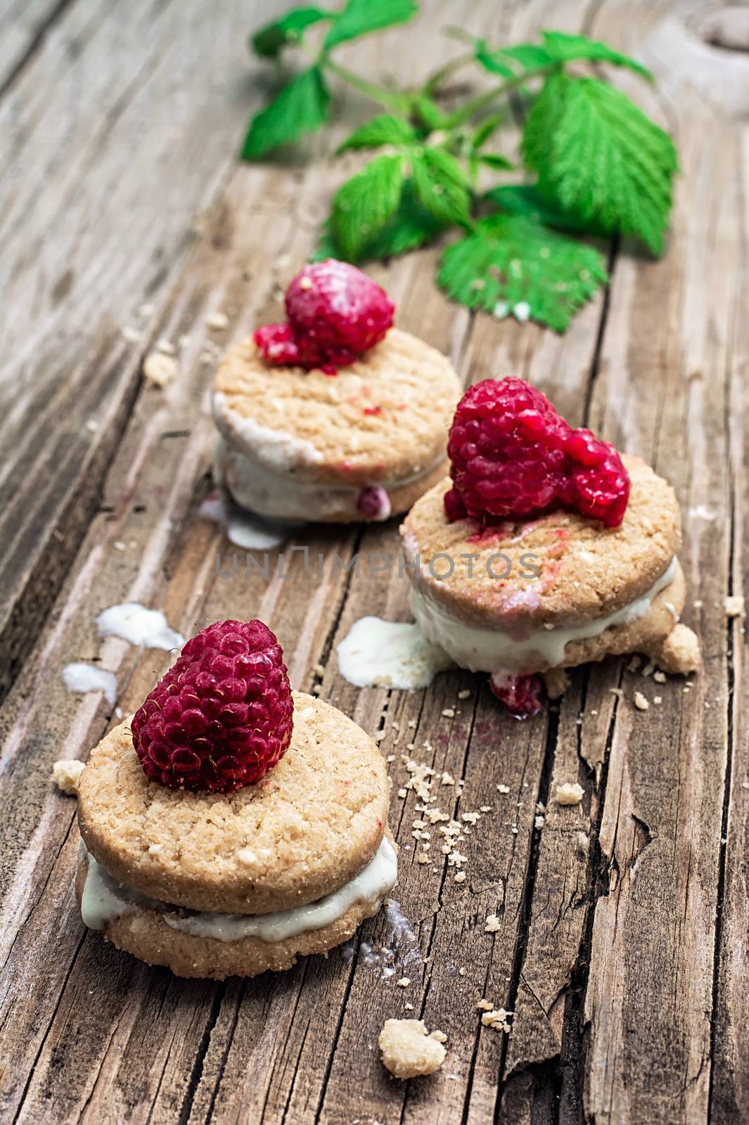 homemade shortbread with custard decorated with raspberries