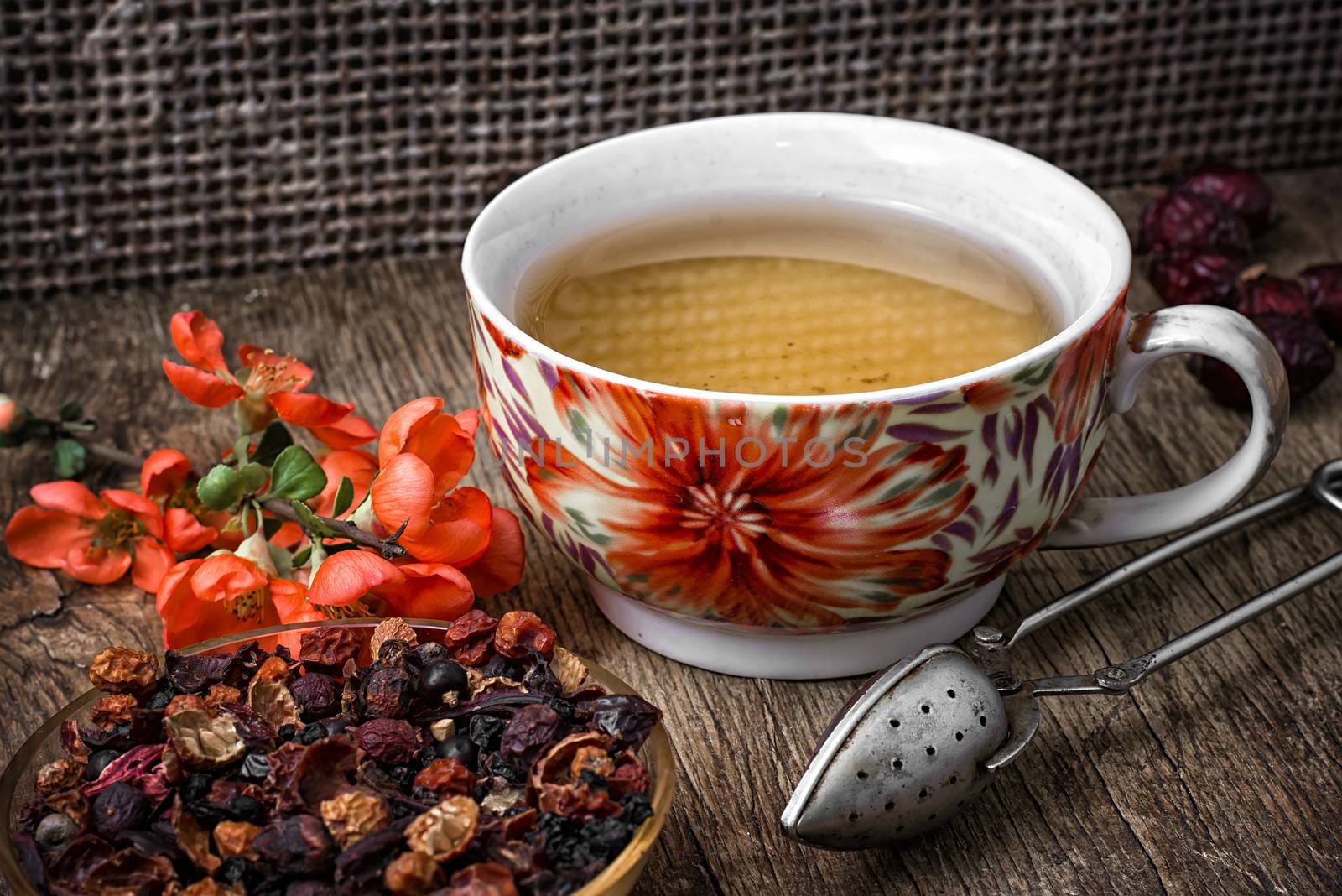 porcelain cup of fragrant tea for medicinal herbs in retro style by LMykola