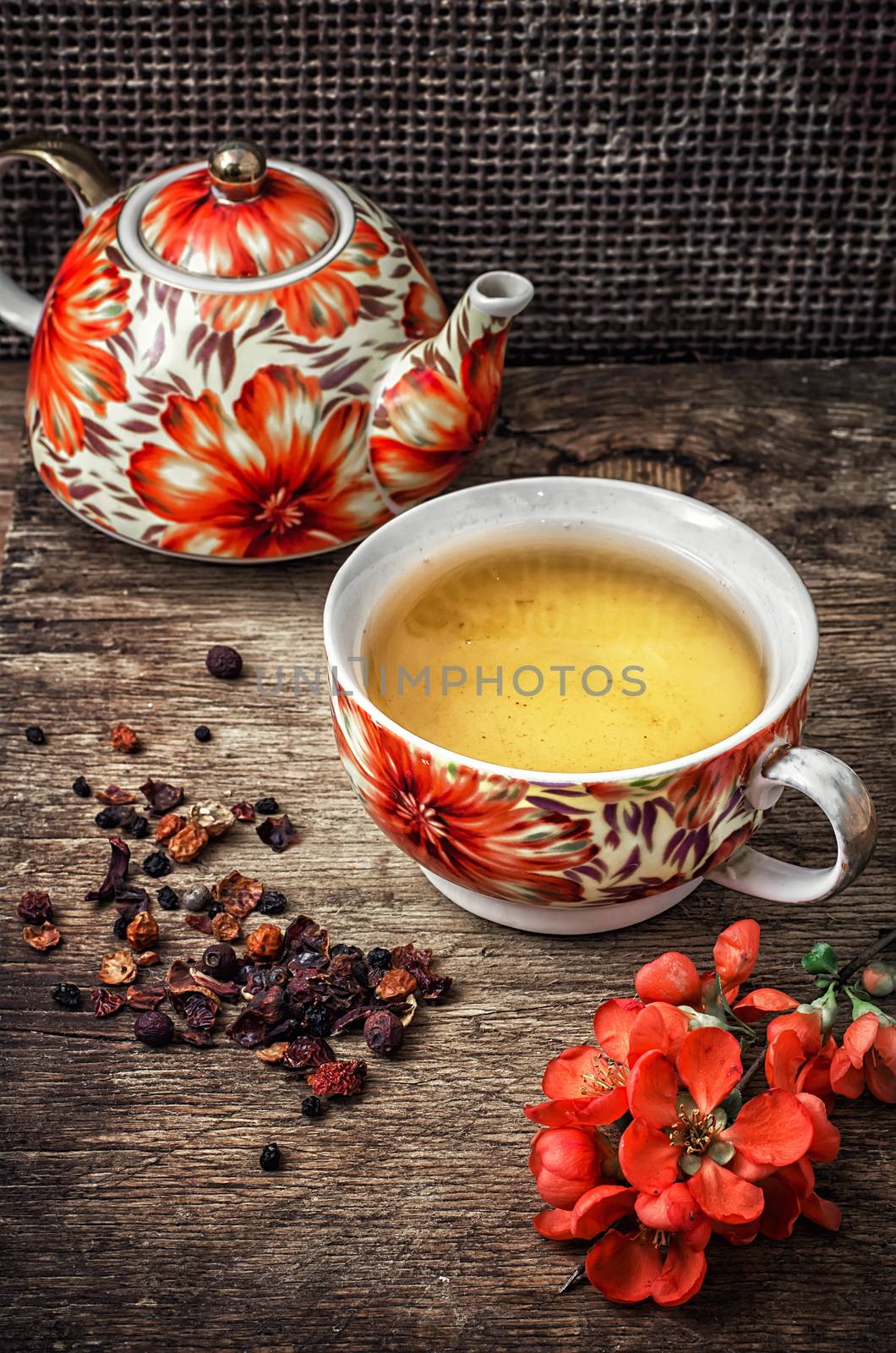 porcelain cup of fragrant tea for medicinal herbs in retro style.photo tinted