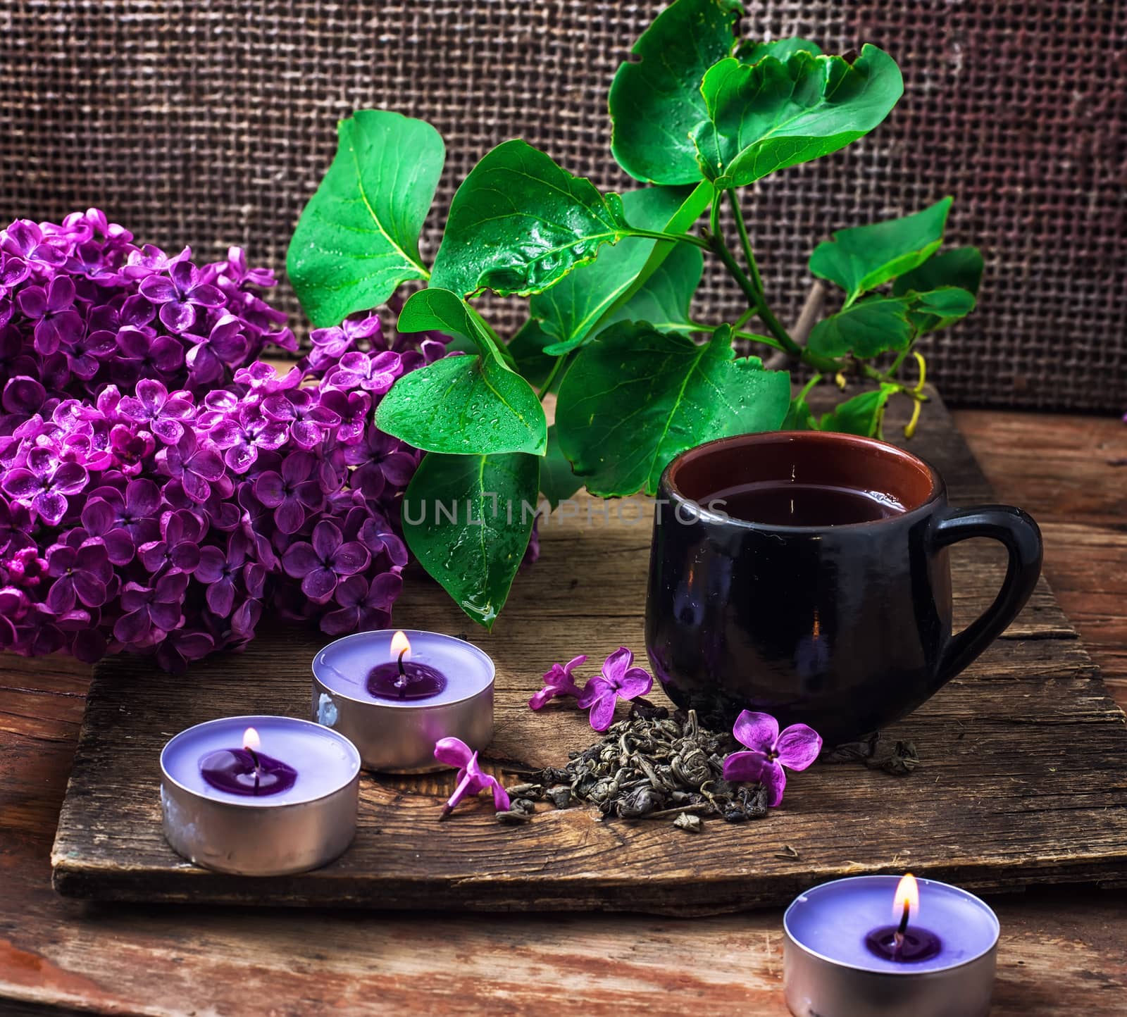 Cup of tea in composition with lilacs by LMykola