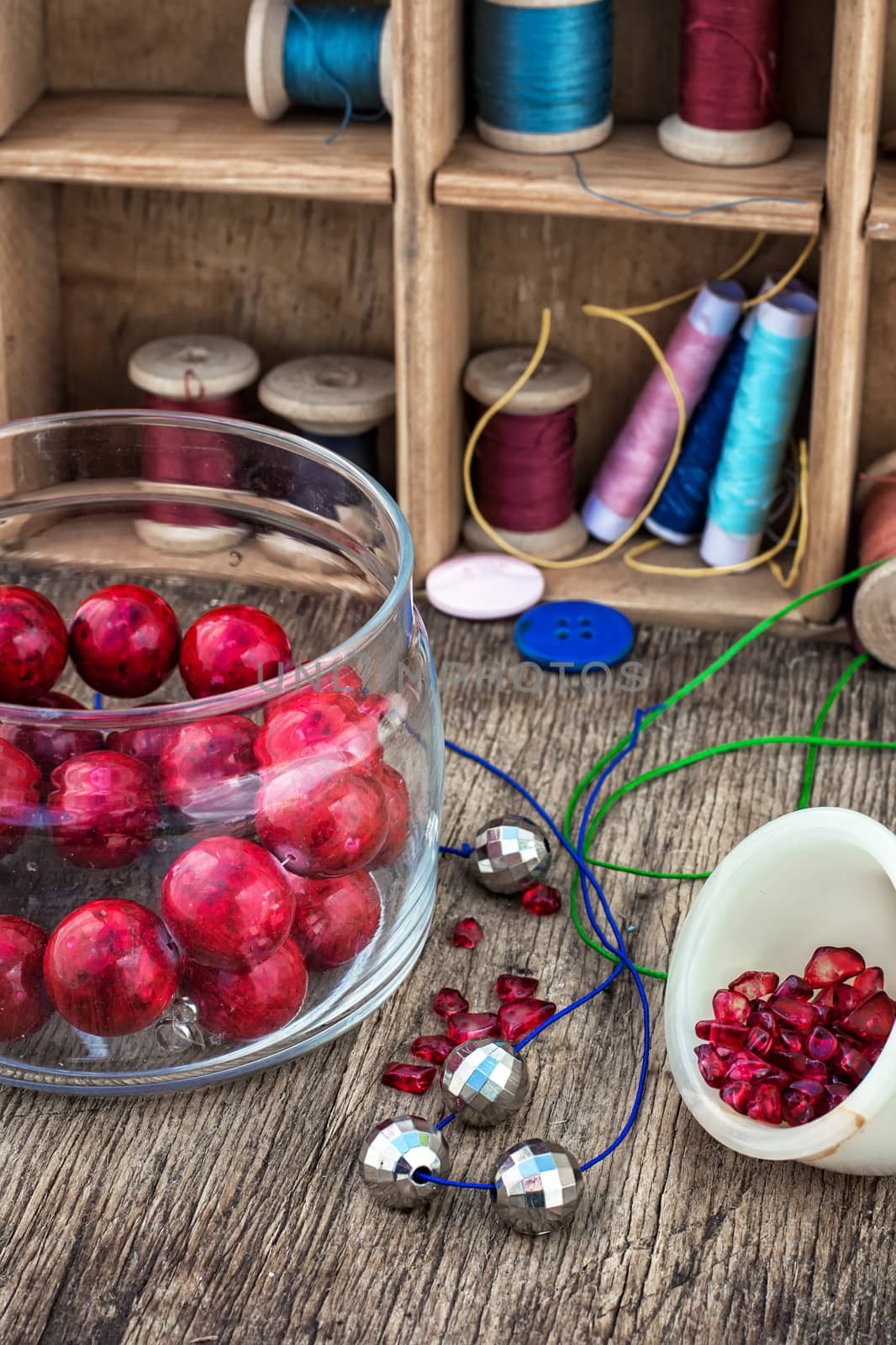 different tools for needlework beading and sewing in vintage style.Selective focus