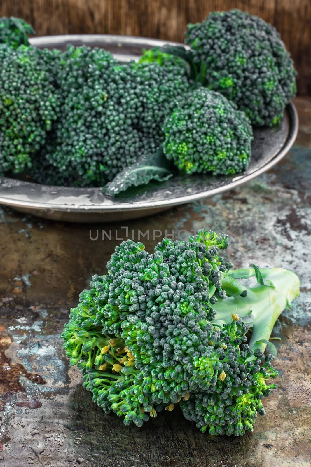 harvest broccoli cauliflower on an iron plate.