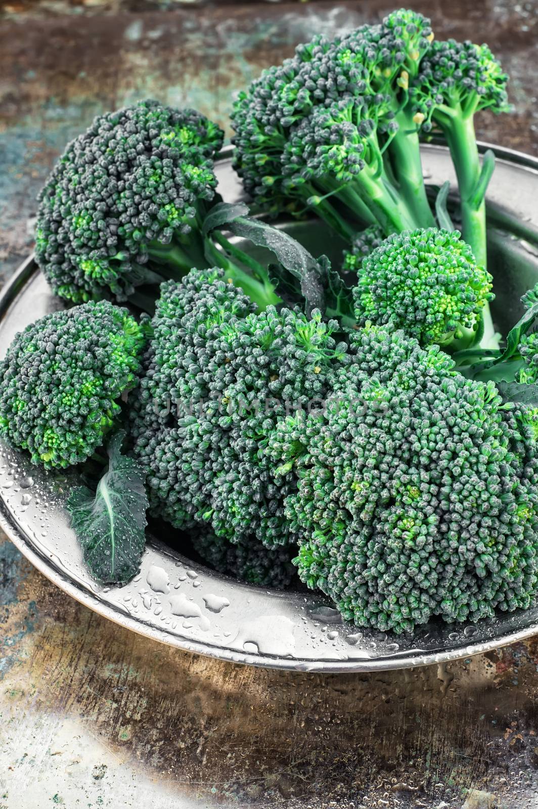 harvest broccoli cauliflower on an iron plate.