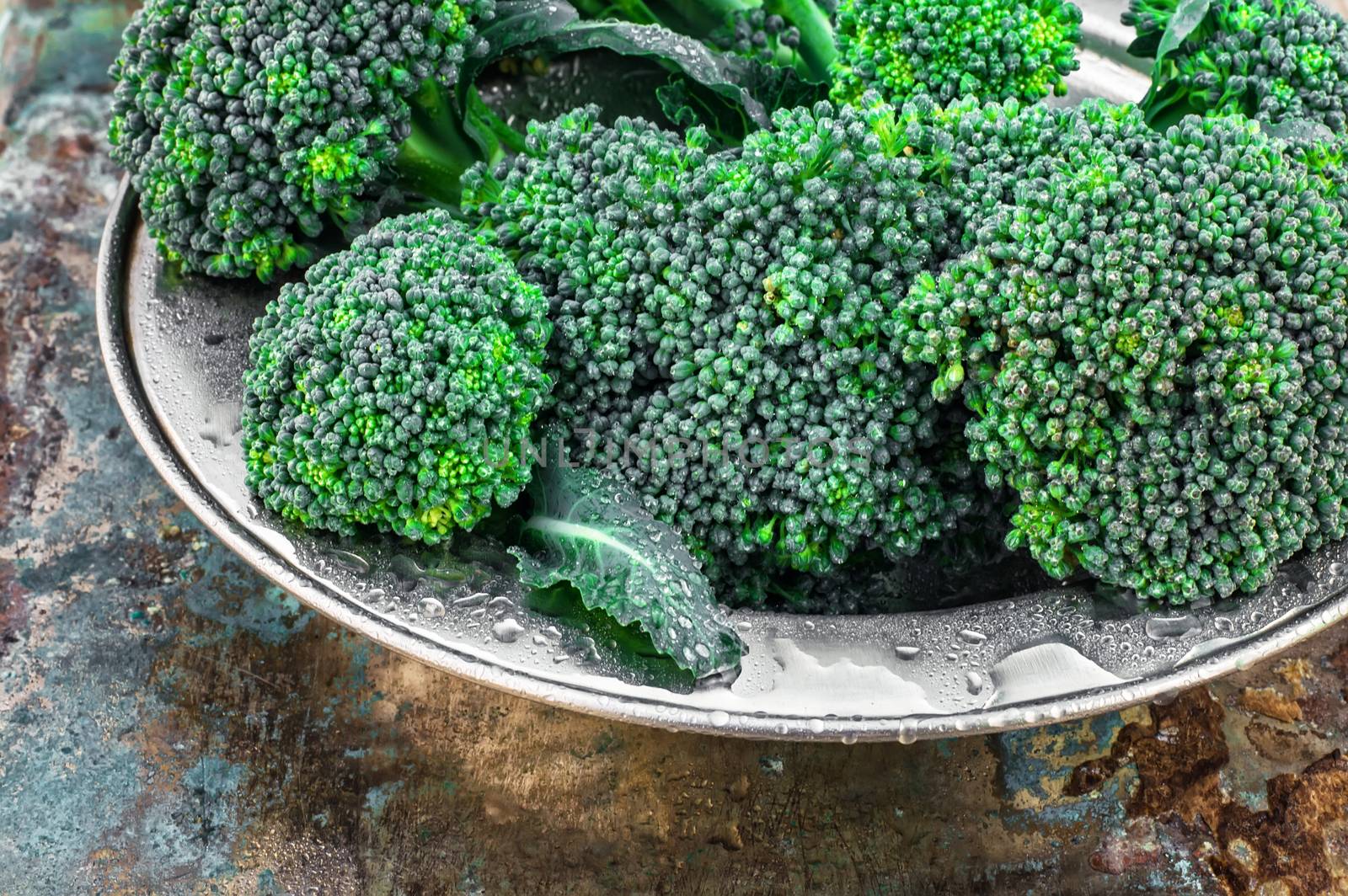 harvest broccoli cauliflower on an iron plate.