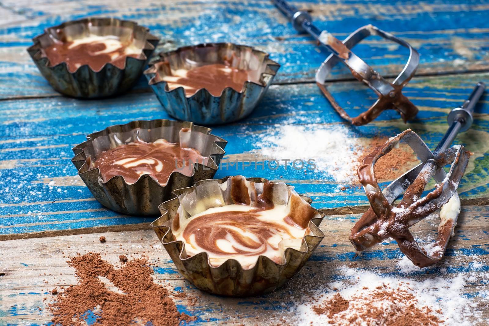 process of making coffee muffins on wooden countertop in rustic style.Photo tinted.Selective focus