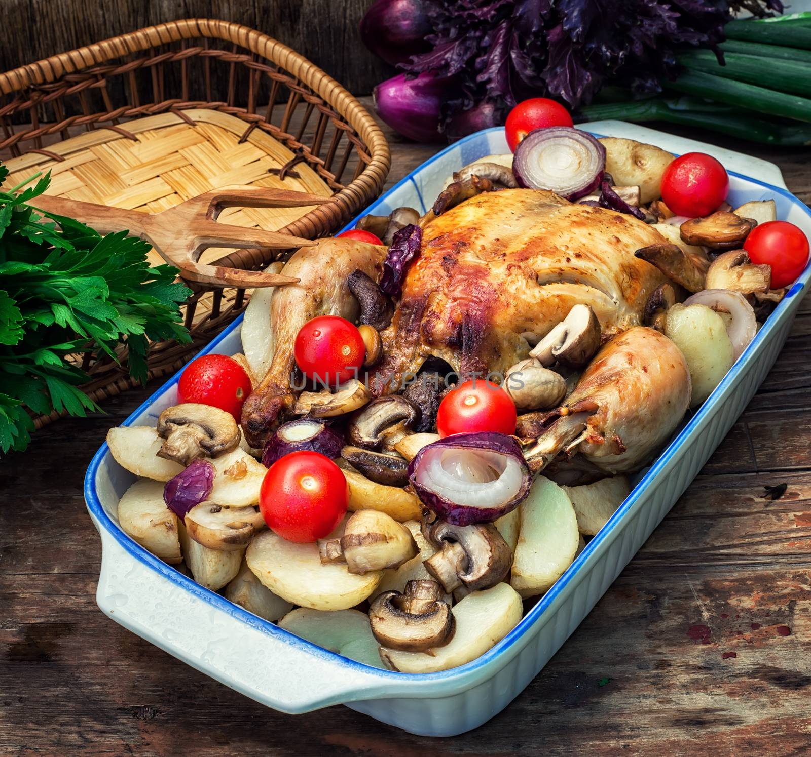 delicious chicken baked potato and fresh vegetables by LMykola