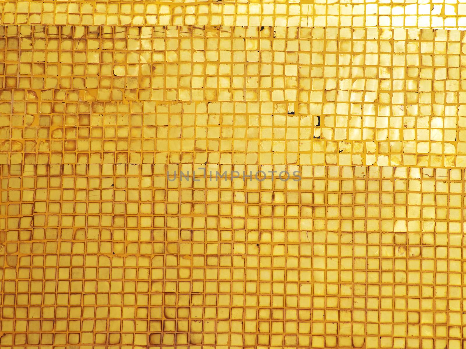 Abstract golden grunge mosaic with highlight texture