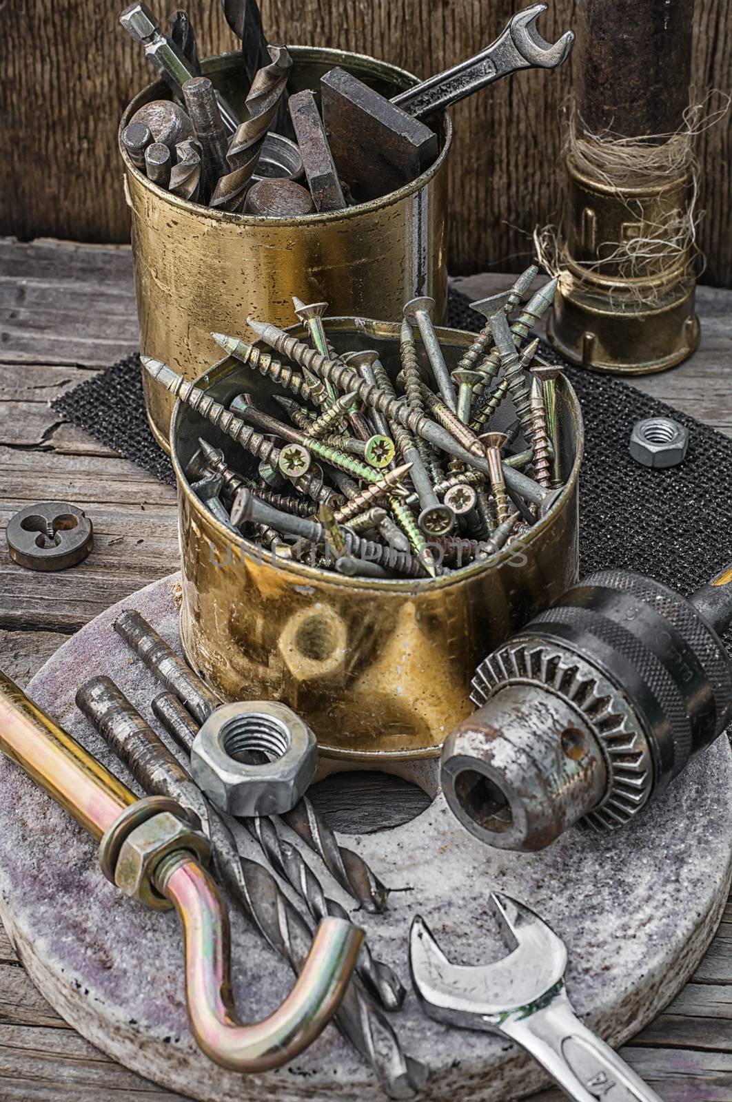 Set of old tools of the keys,screws and drills.