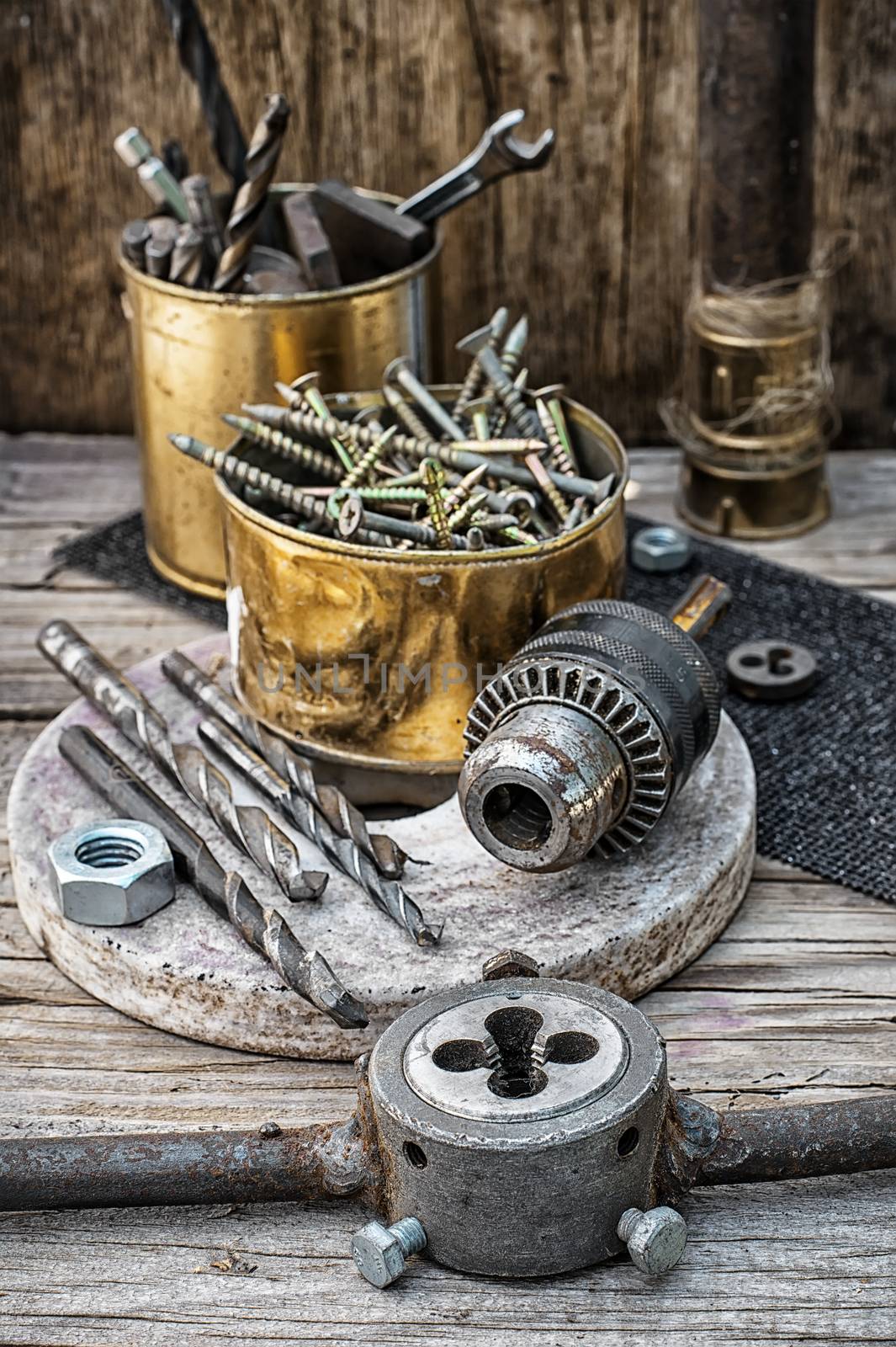 Set of old tools of the keys,screws and drills.