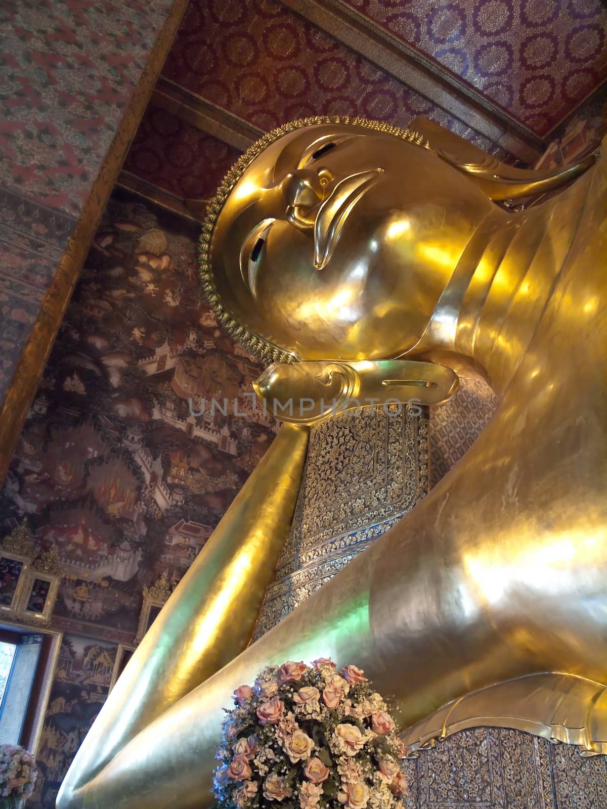 Reclining golden buddha by Exsodus