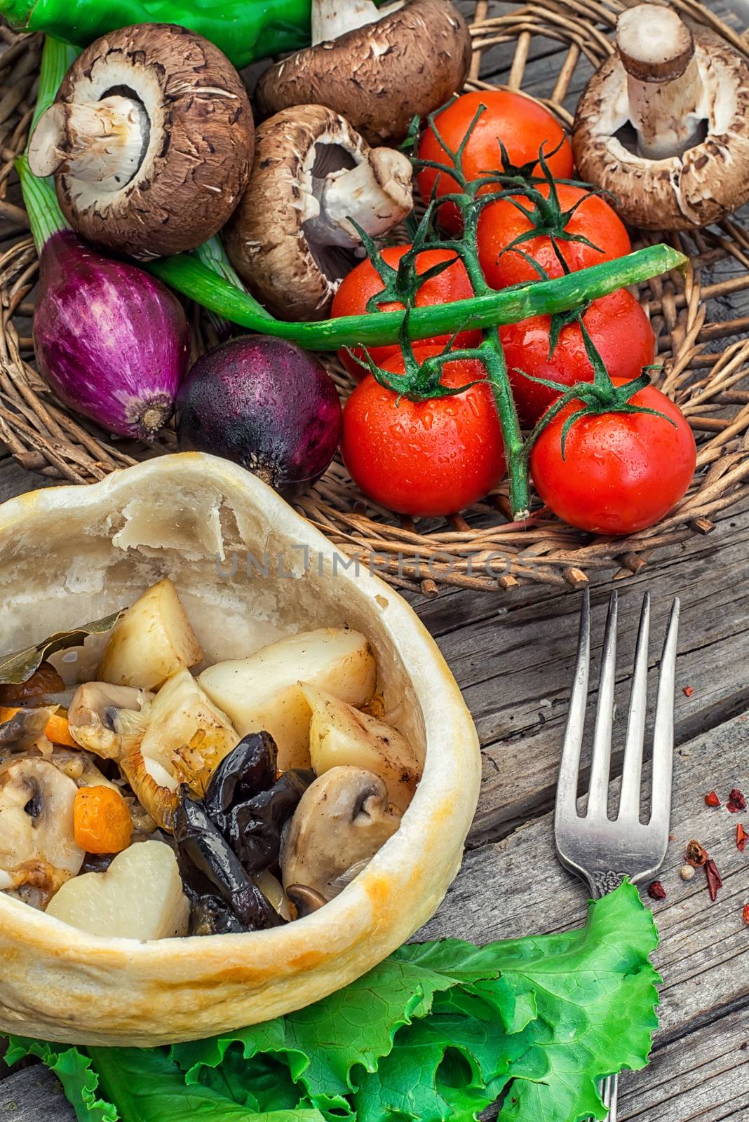 vegetable hot plate made of baked dough cooked in  rustic style.Photo tinted