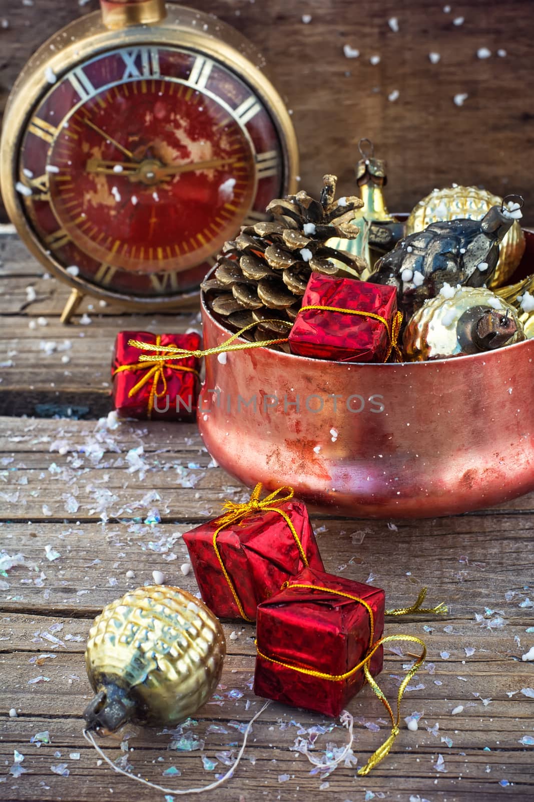 Festive Christmas decorations on wooden background in vintage style.Photo tinted.Selective focus