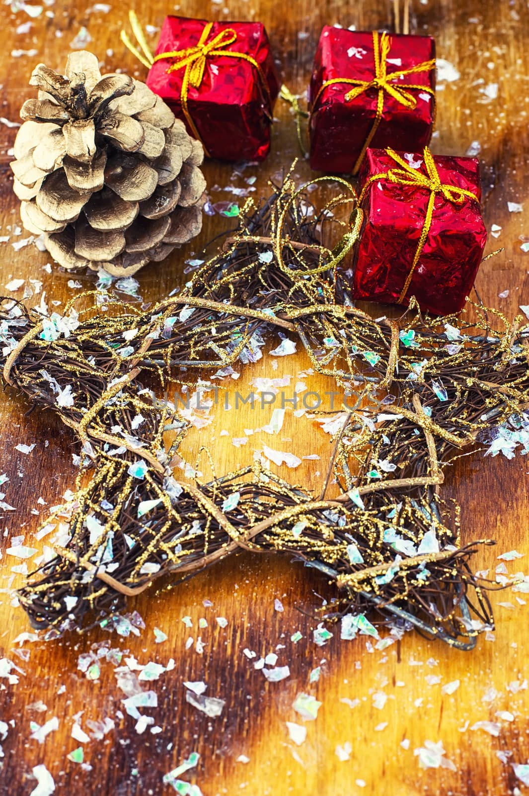 Festive Christmas decorations on wooden background in vintage style.Photo tinted.Selective focus