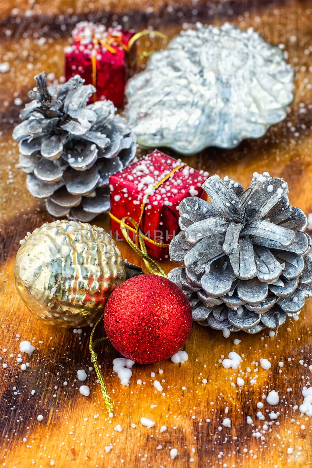 Festive Christmas decorations on wooden background in vintage style.Photo tinted.