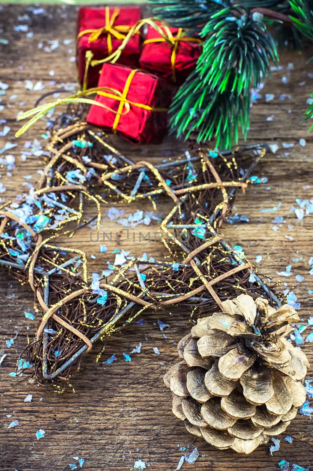 Festive Christmas decorations on wooden background in vintage style.Photo tinted.Selective focus