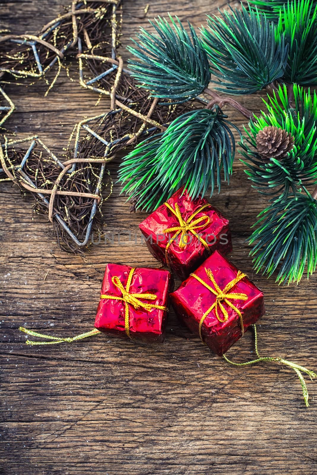 Festive Christmas decorations on wooden background in vintage style.Photo tinted.