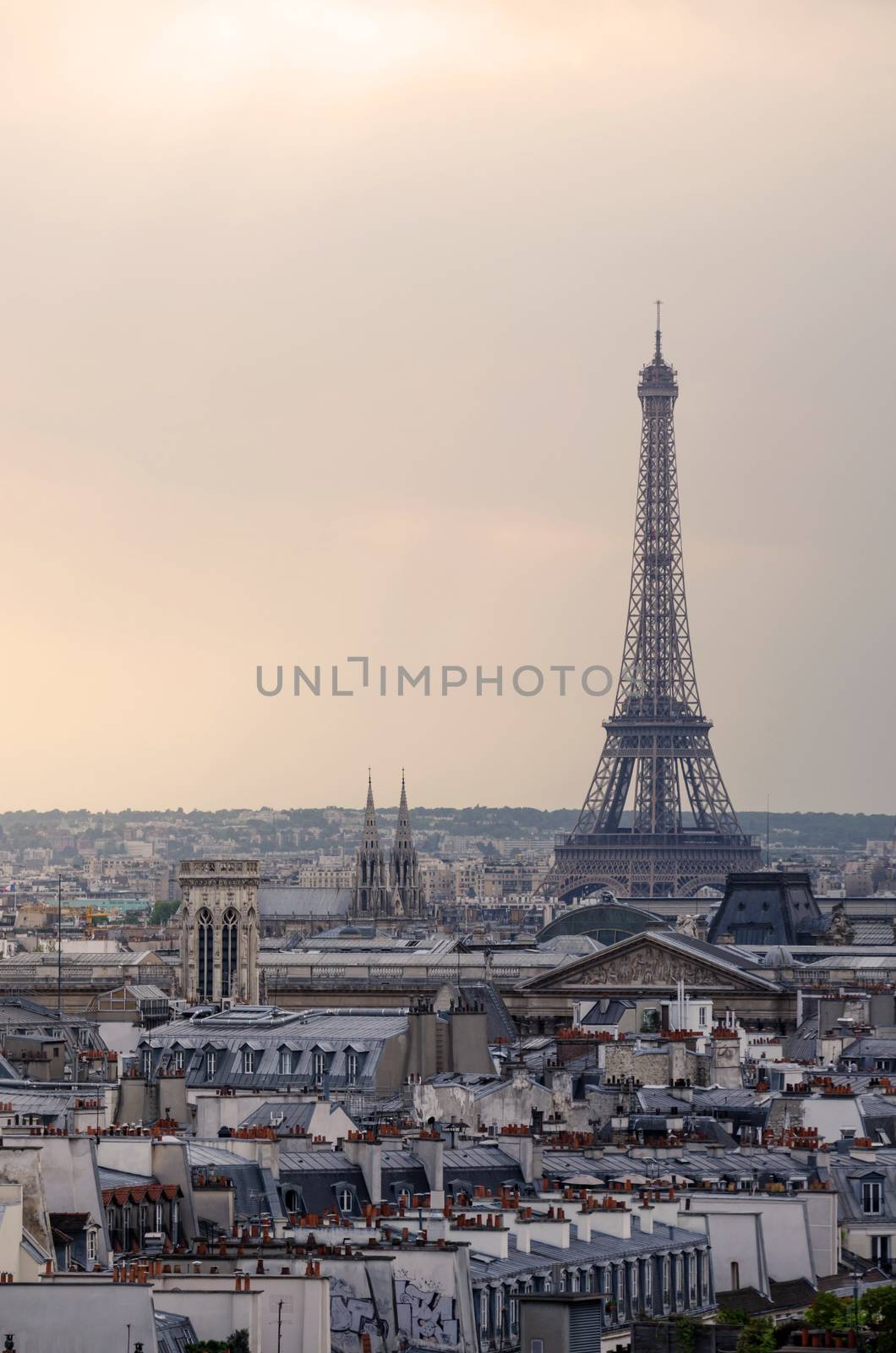 Eiffel Tower with Paris Skyline at sunset by siraanamwong