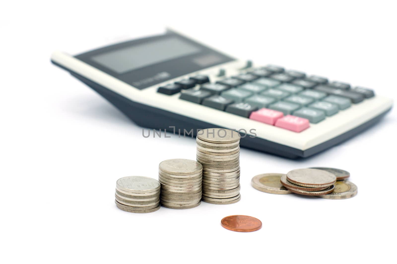 Thai stack coins in financial concept on white background, graph stack coin with accounting calculator