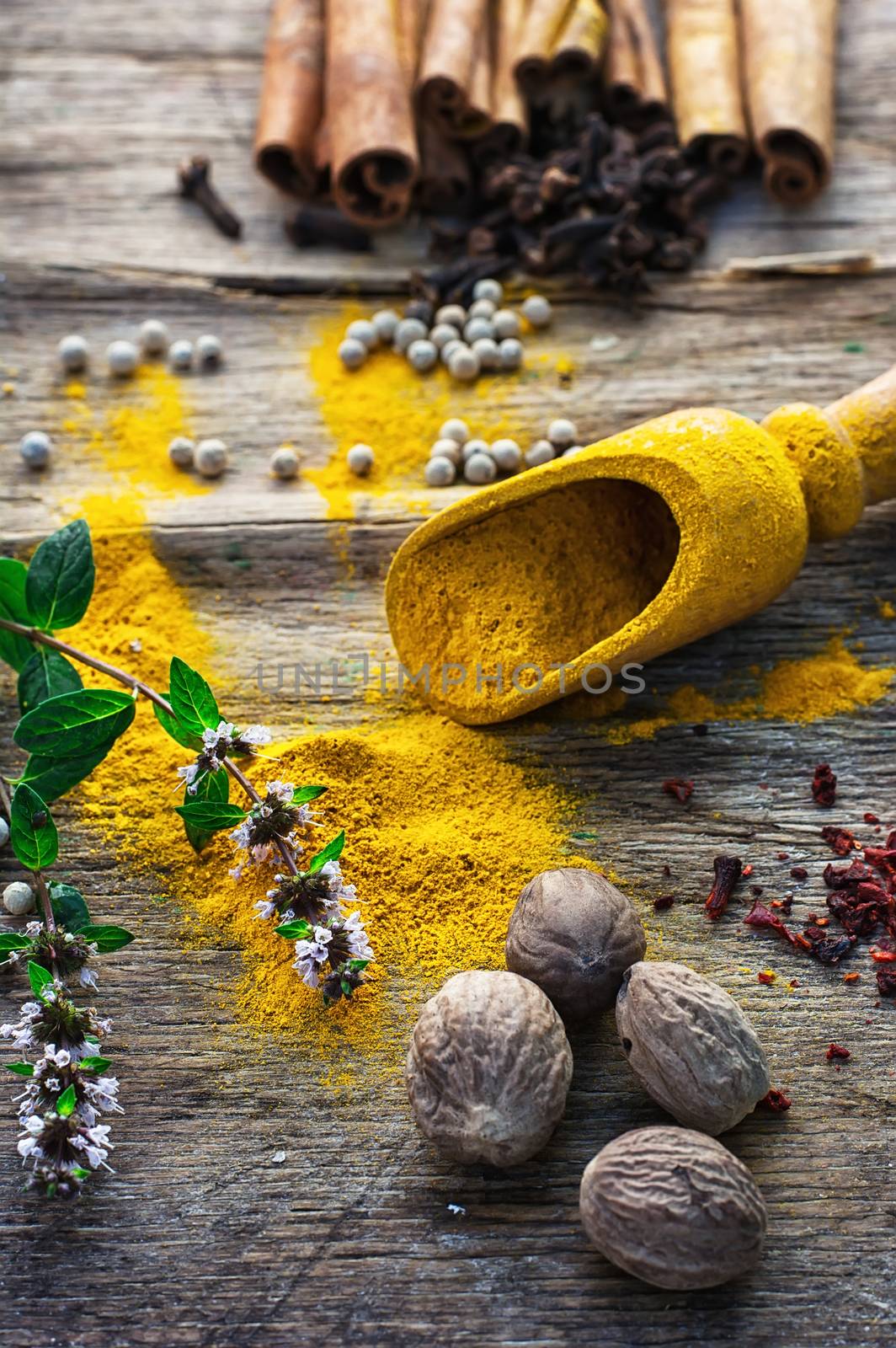 Set of different spices on the old wooden table.Photo rustic