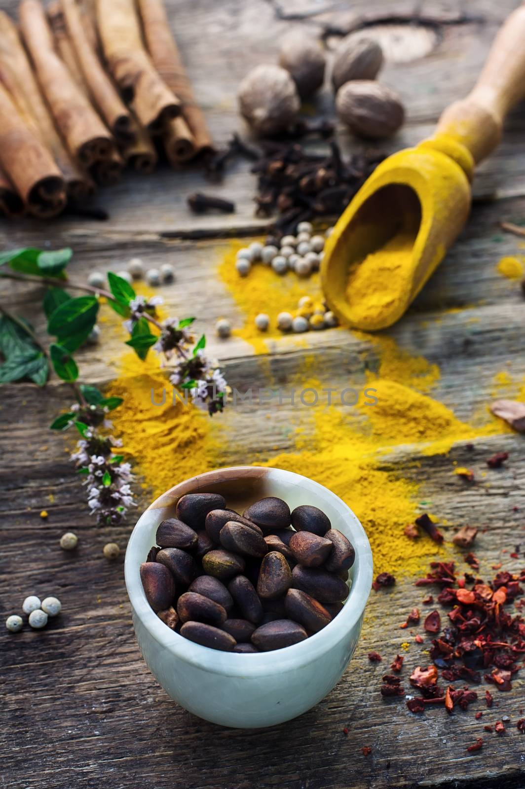 Set of different spices on the old wooden table.Photo rustic