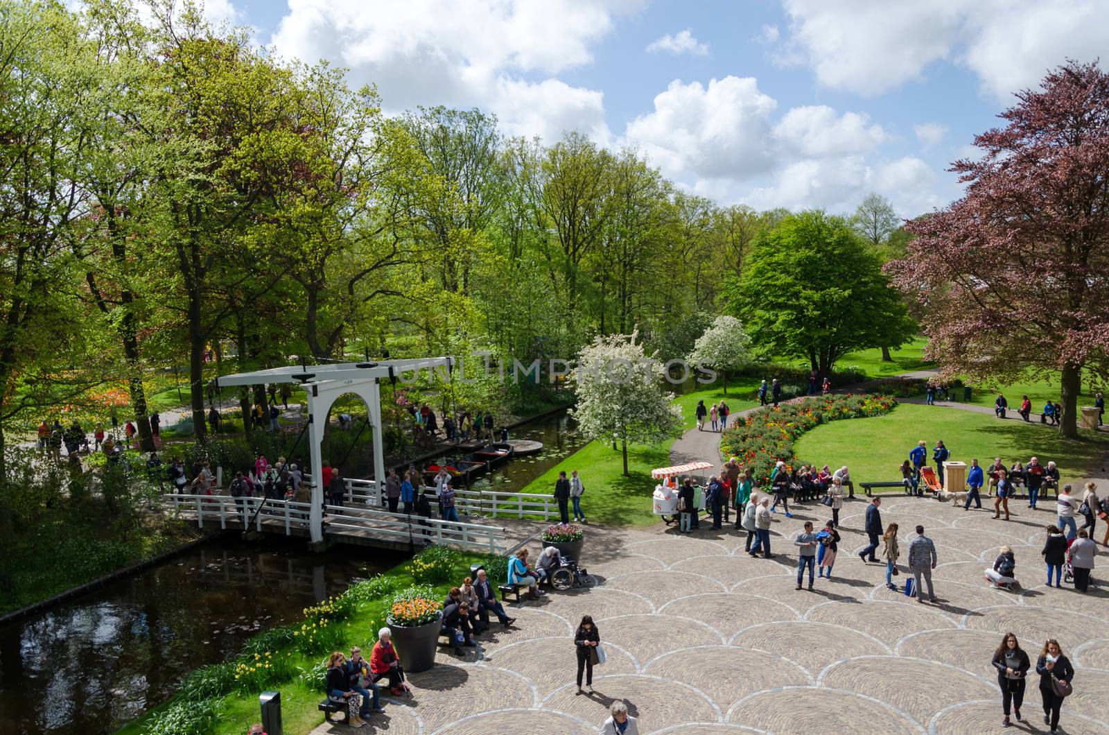 Lisse, The Netherlands - May 7, 2015: Tourists visit famous garden keukenhof by siraanamwong