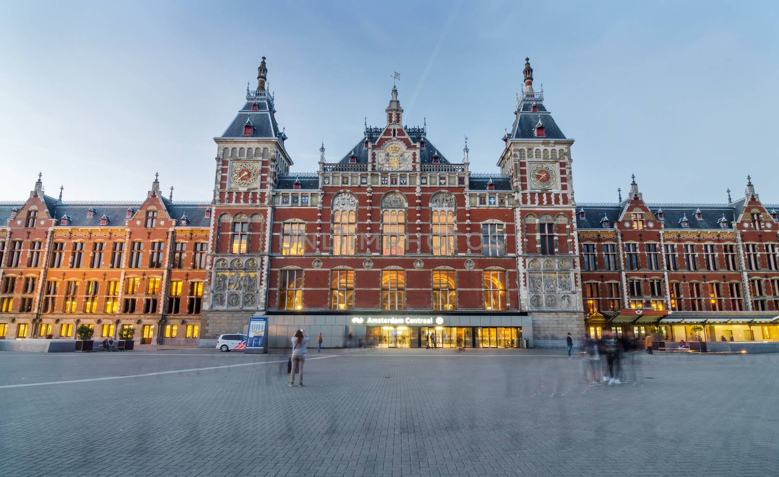 Amsterdam, Netherlands - May 8, 2015: People at Amsterdam Central station by siraanamwong
