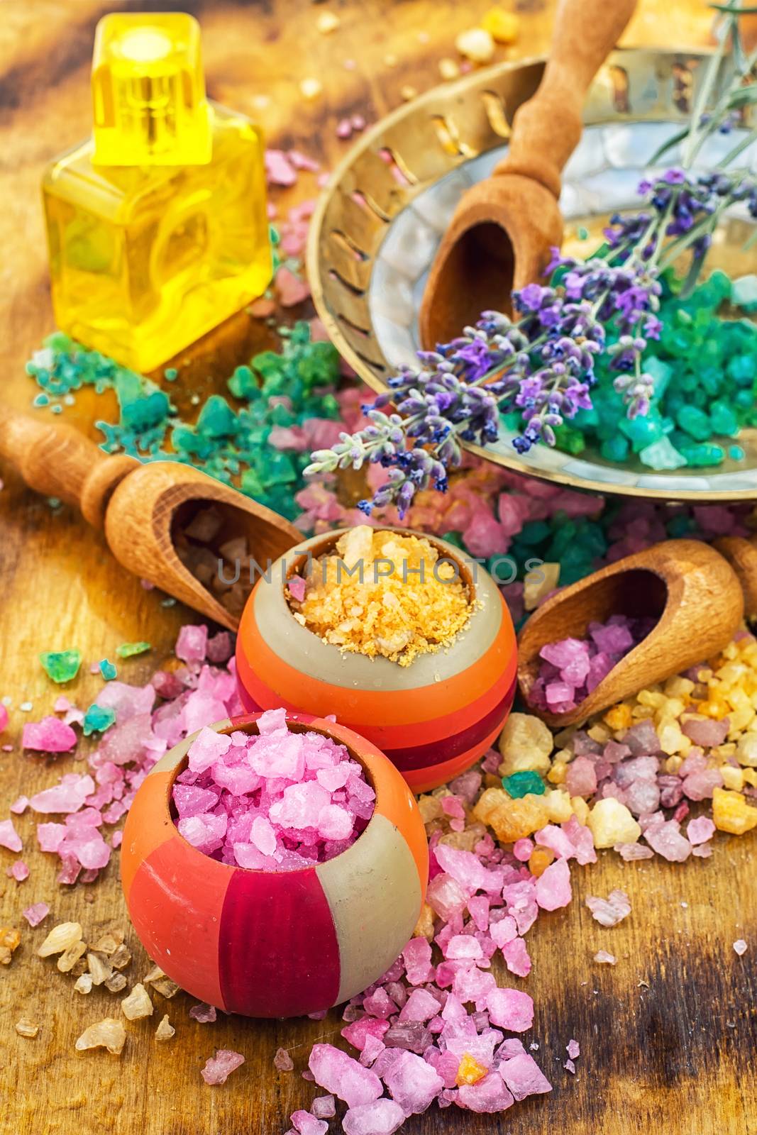 Sea salt for Spa relaxation treatments on the background of wooden scoops