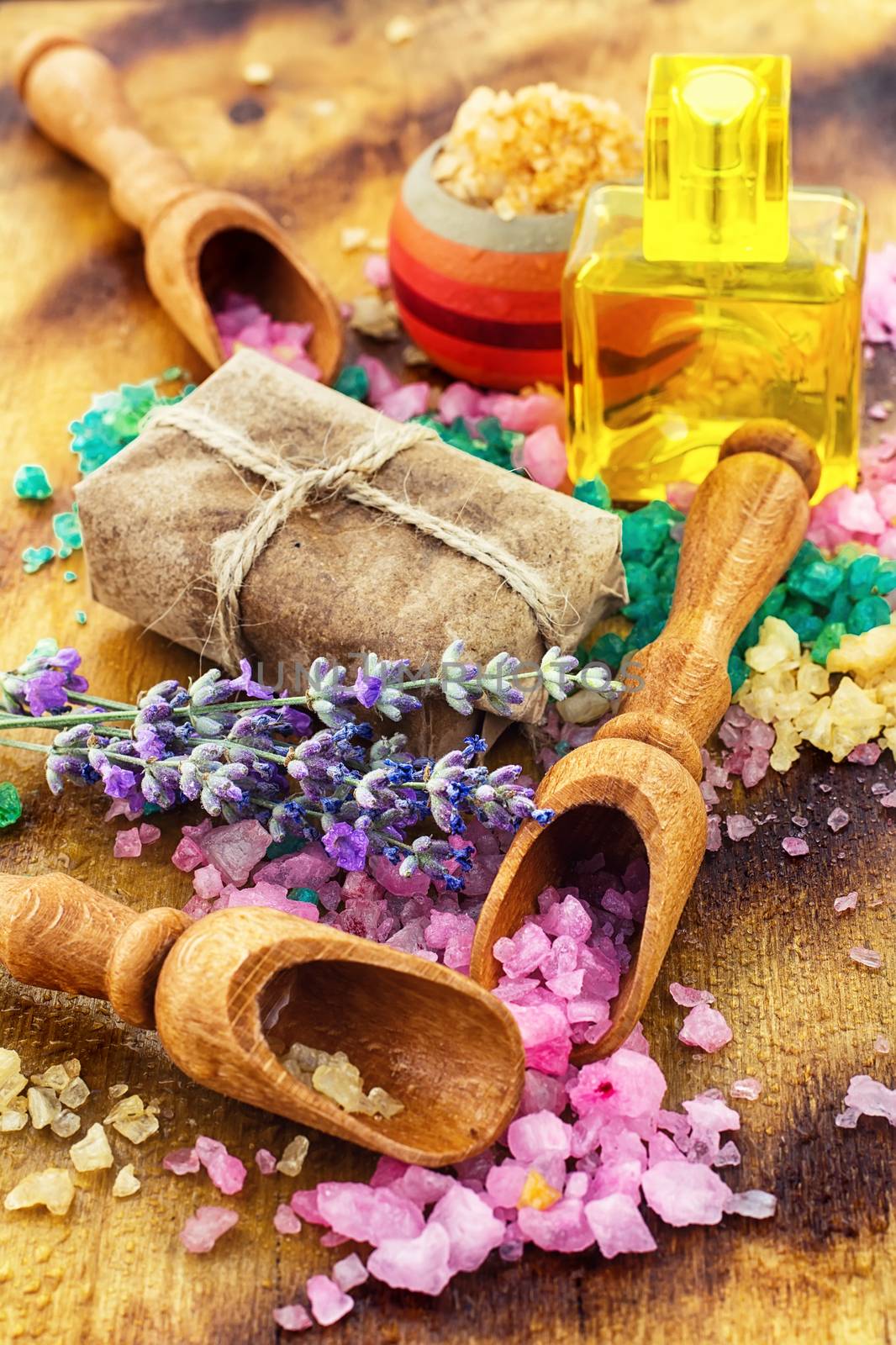 Sea salt for Spa relaxation treatments on the background of wooden scoops