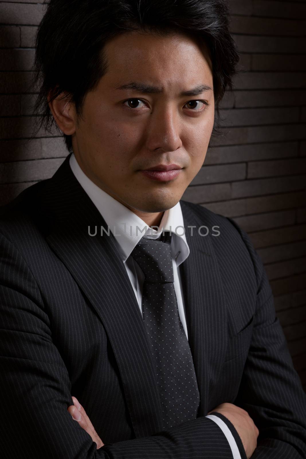 Dark and Serious Asian Male Portrait by justtscott
