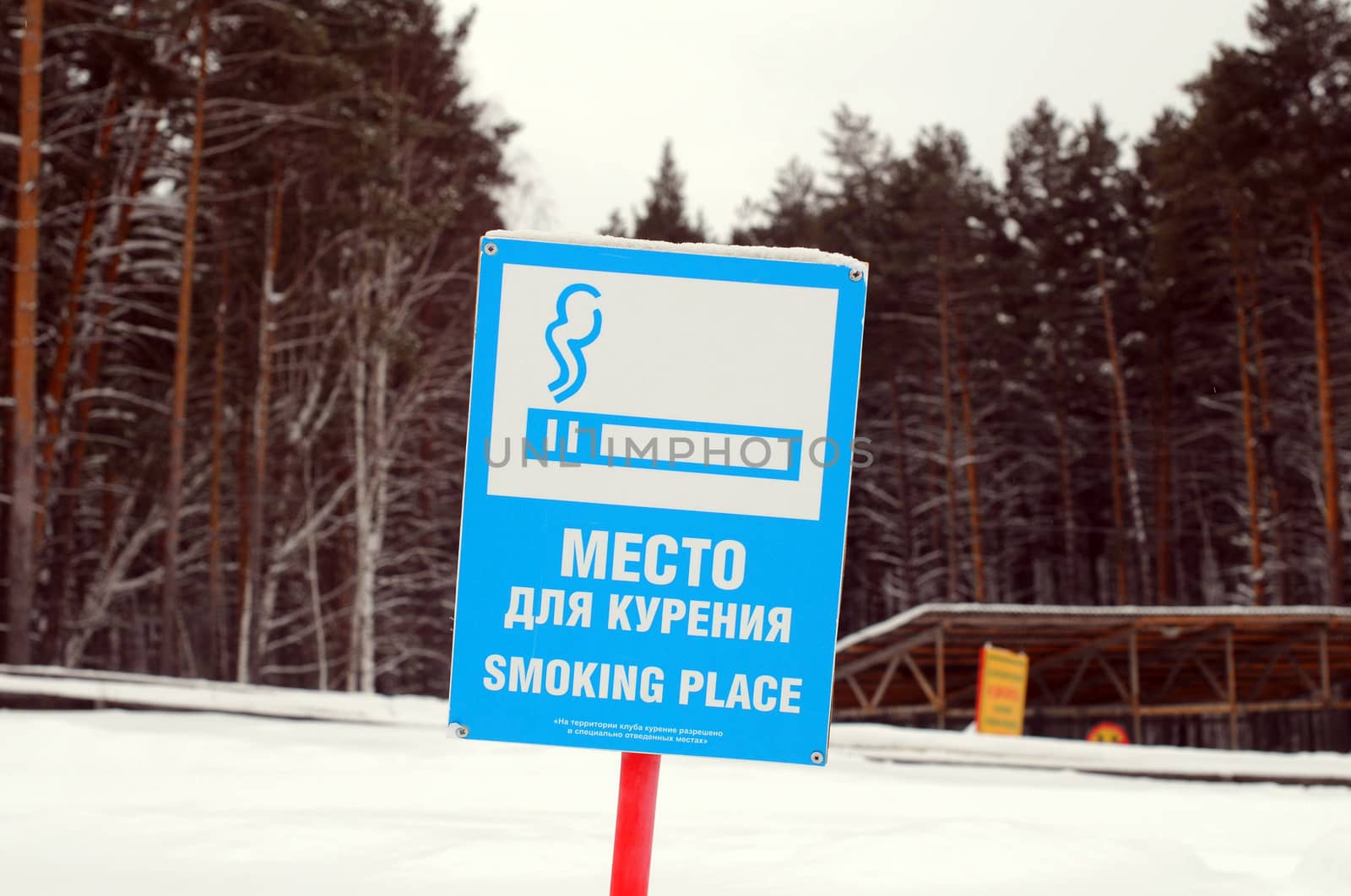 The sign "Smoking area" in country park. by veronka72