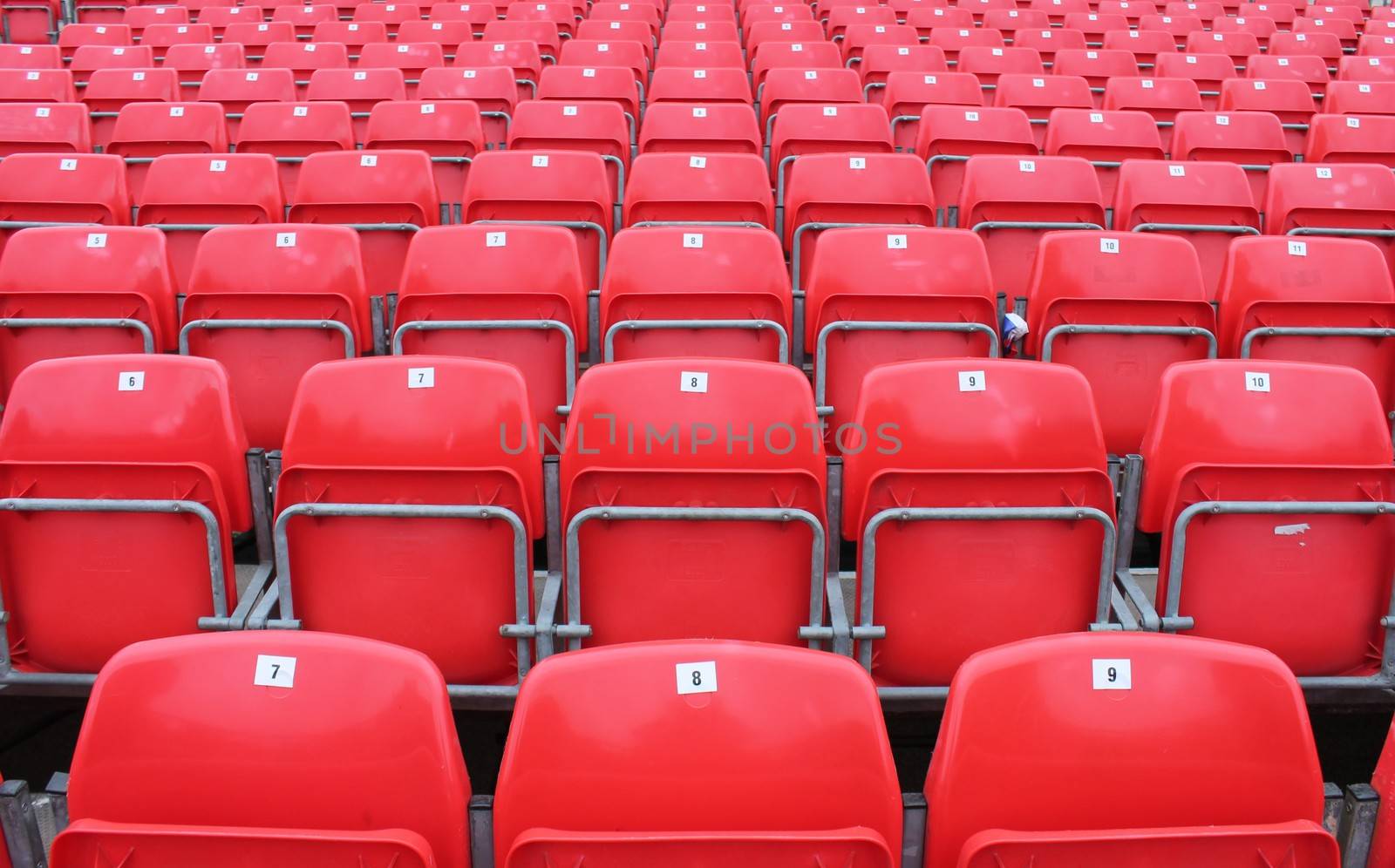 Empty red seats in stadium