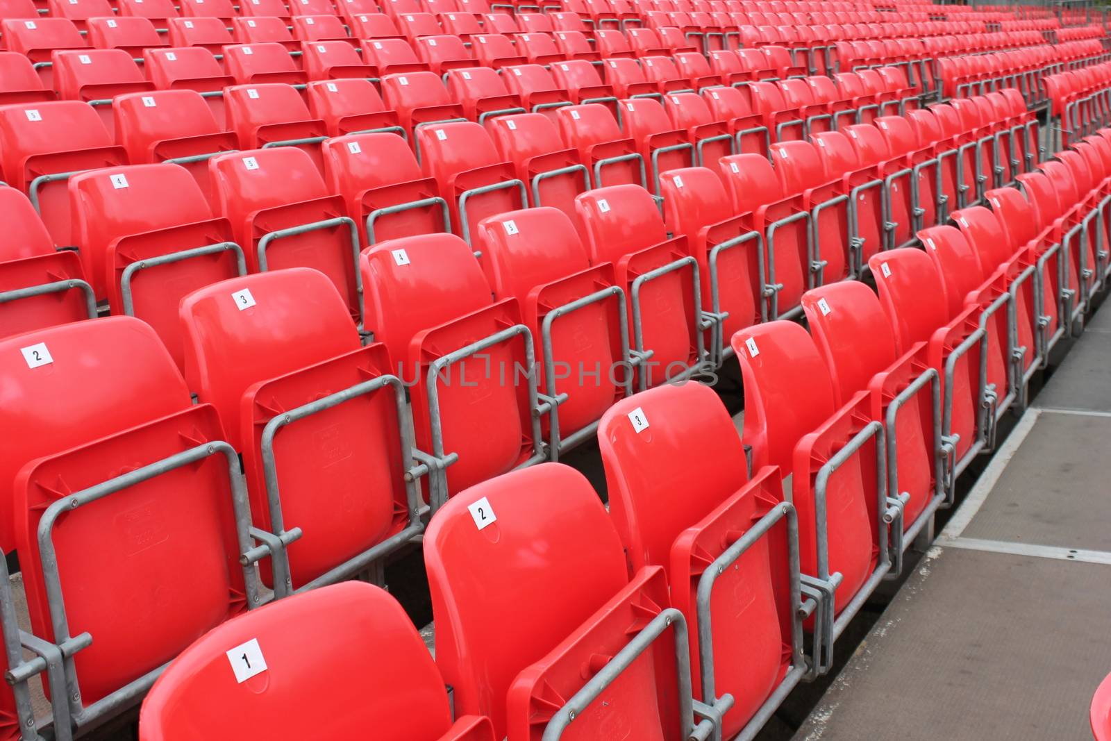 Empty red seats in stadium