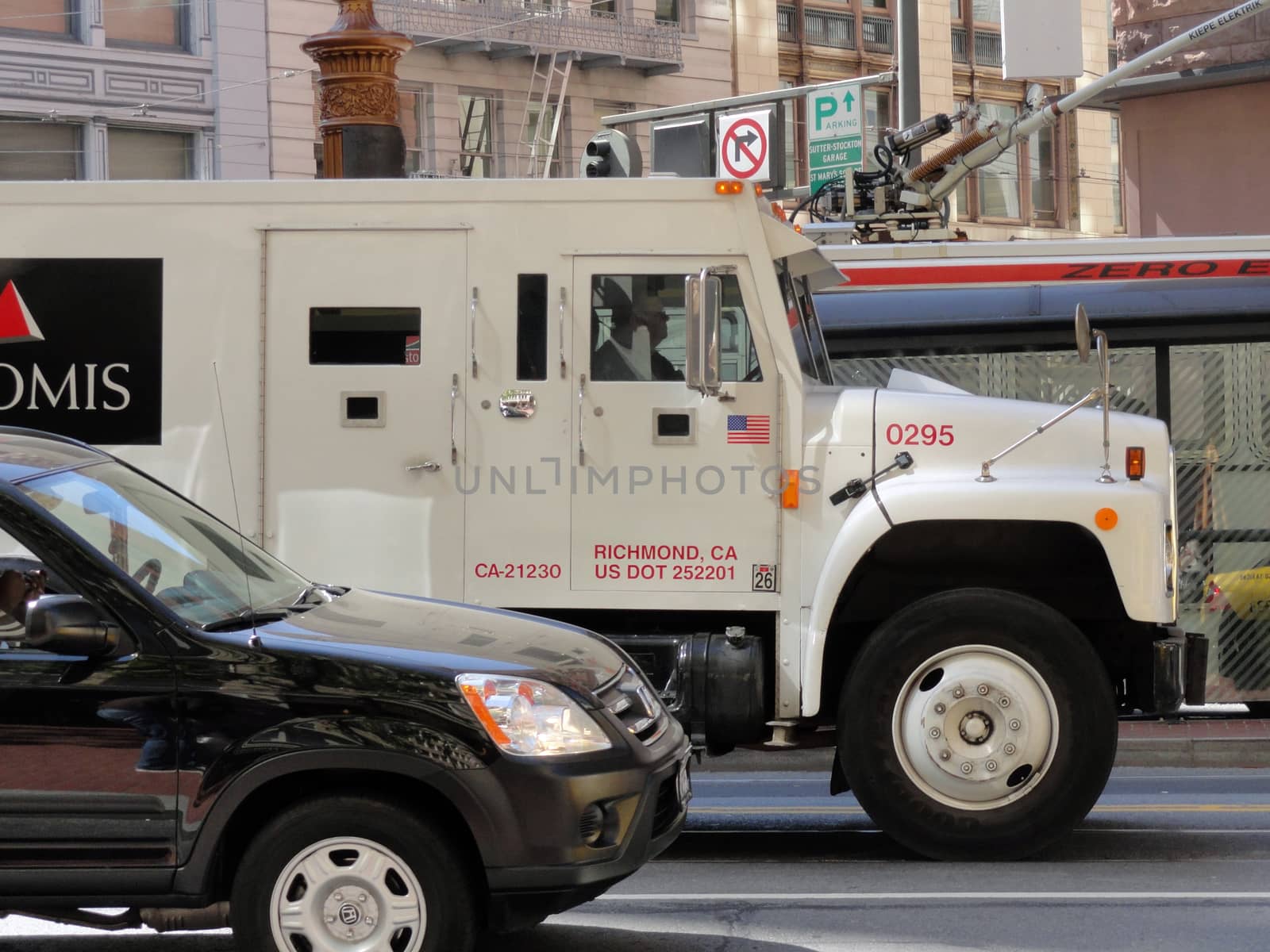 San Francisco, USA - July 23 2010: An Armored Loomis car, in the streets of San Francisco. Loomis is an International Cash handling company   