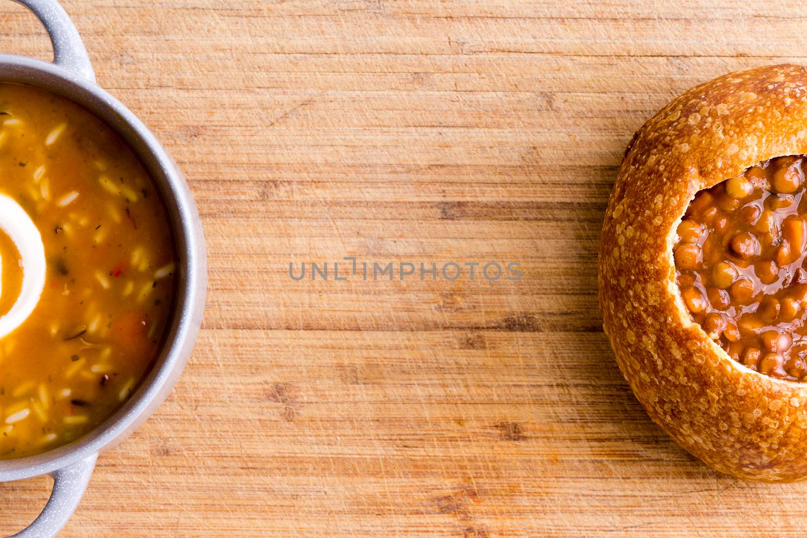 Partially hidden ceramic and bread soup bowls by coskun