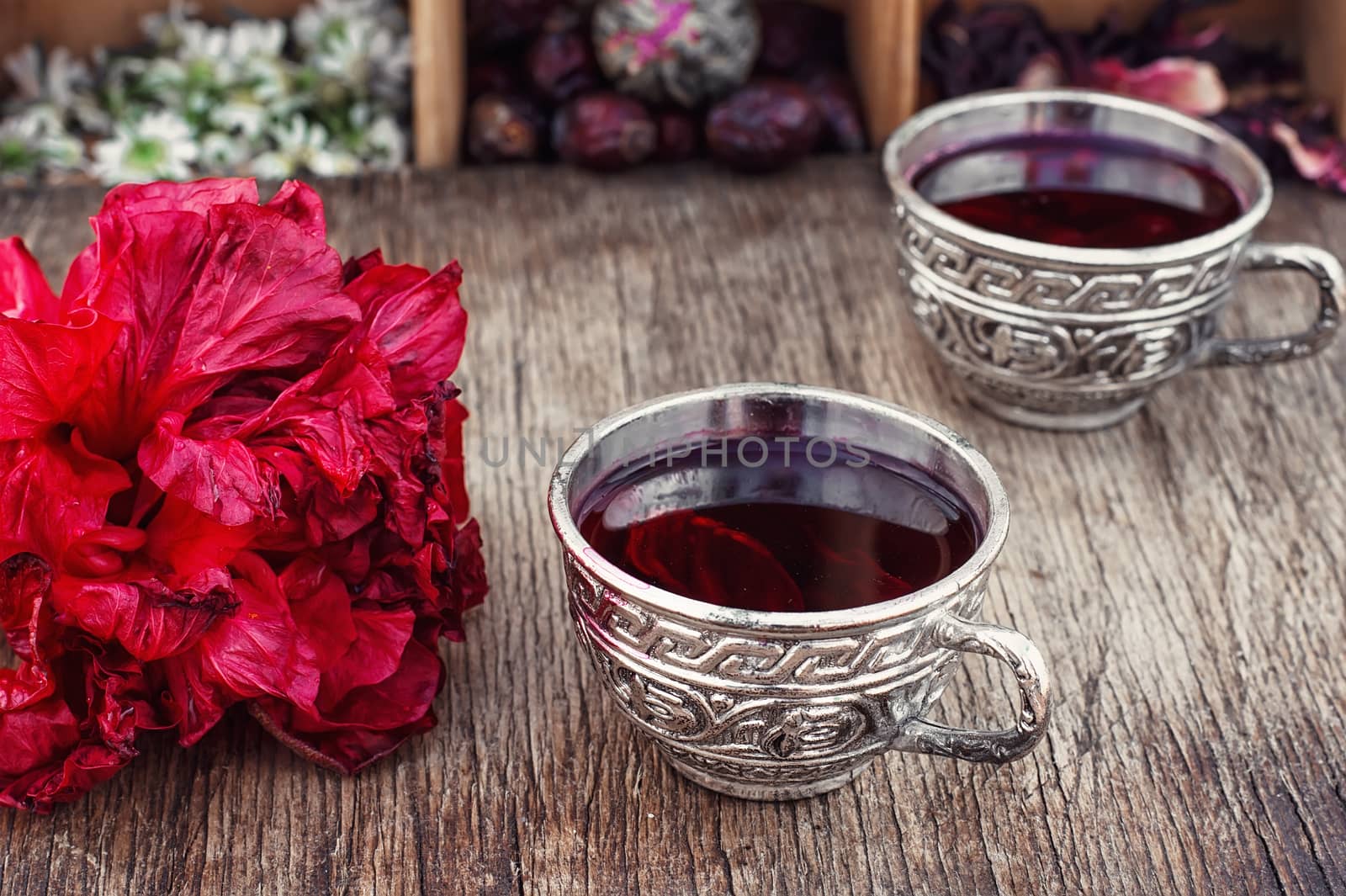 Medicinal tea decoction of hibiscus tea in stylish cups.