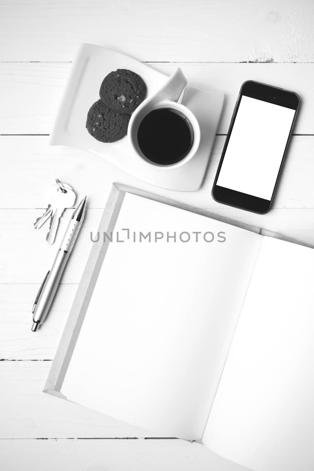 coffee cup with cookie,phone,notebook and key black and white co by ammza12
