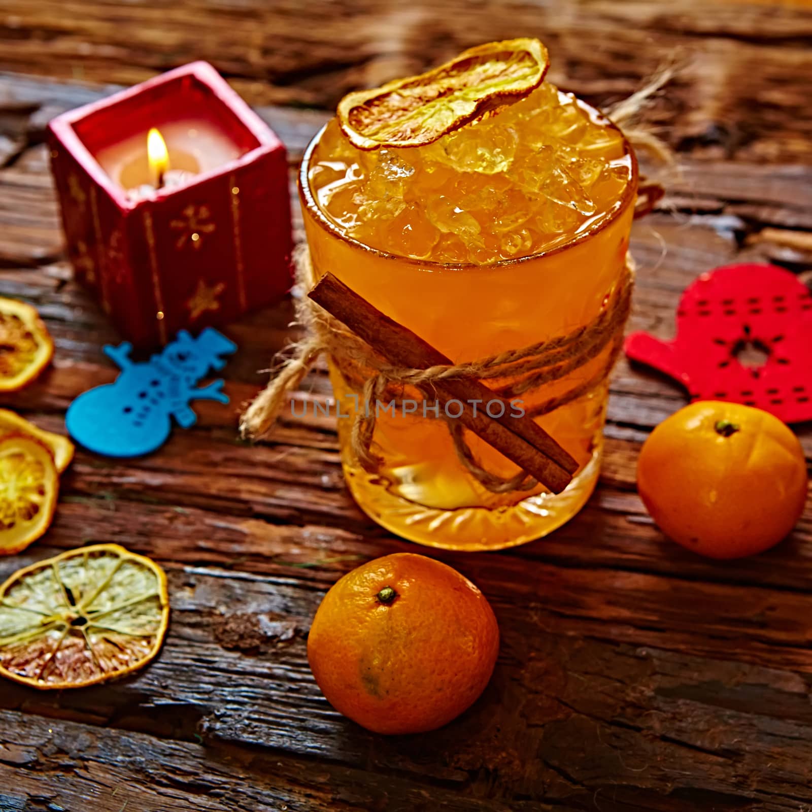 Fresh juice of ripe mandarins in glass. by sarymsakov