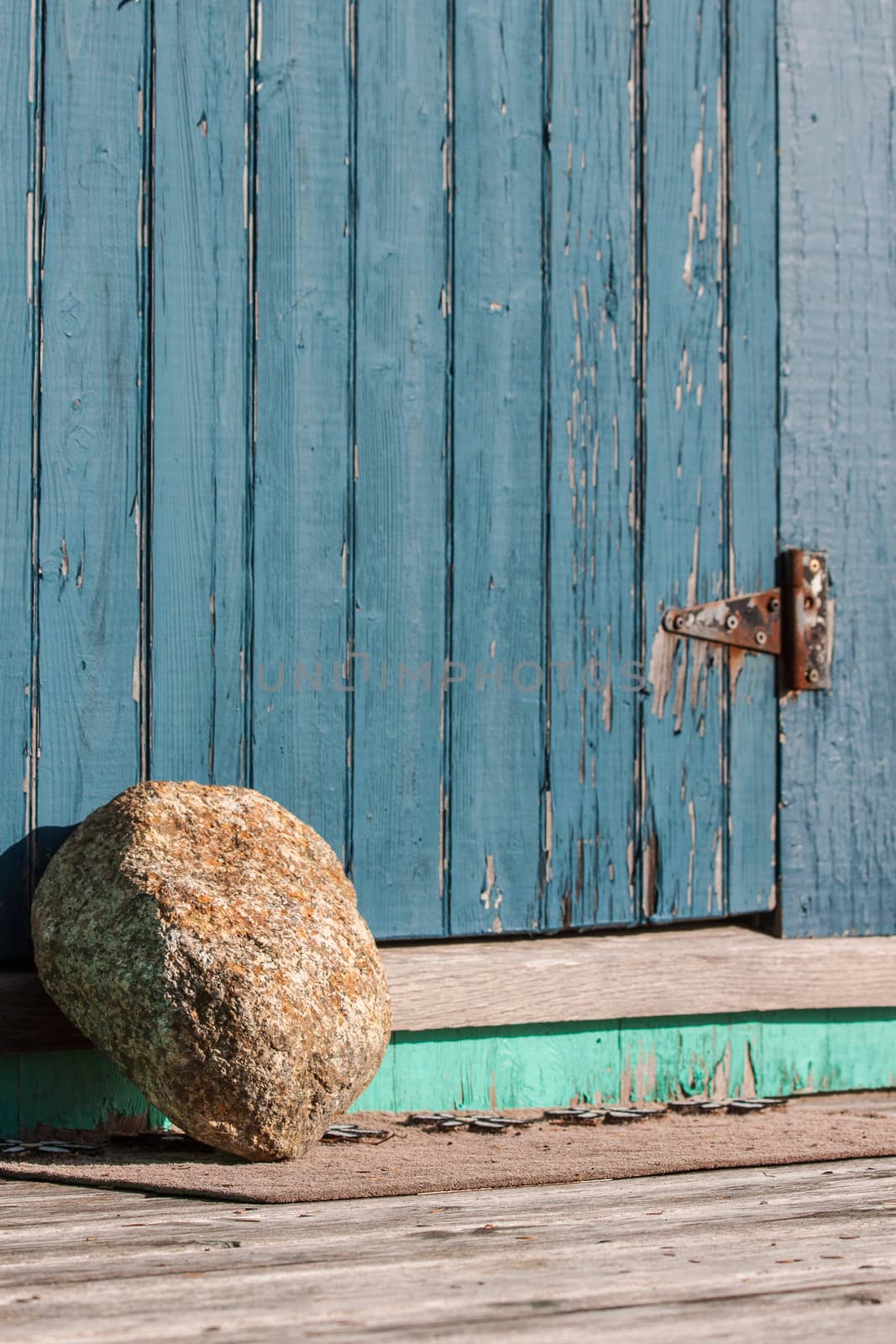 Rock being used as a doorstop