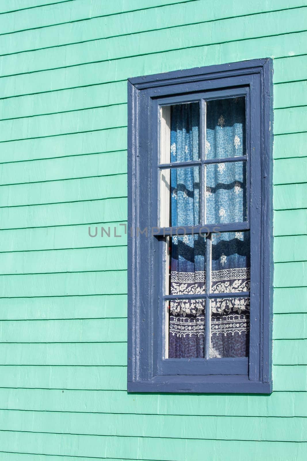 old window in old house with curtains