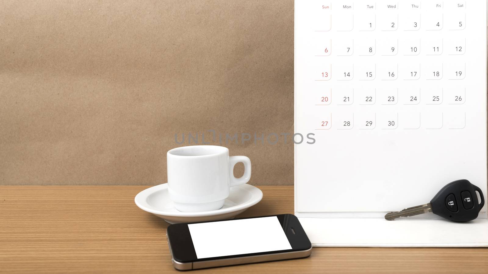 coffee,phone,car key and calendar