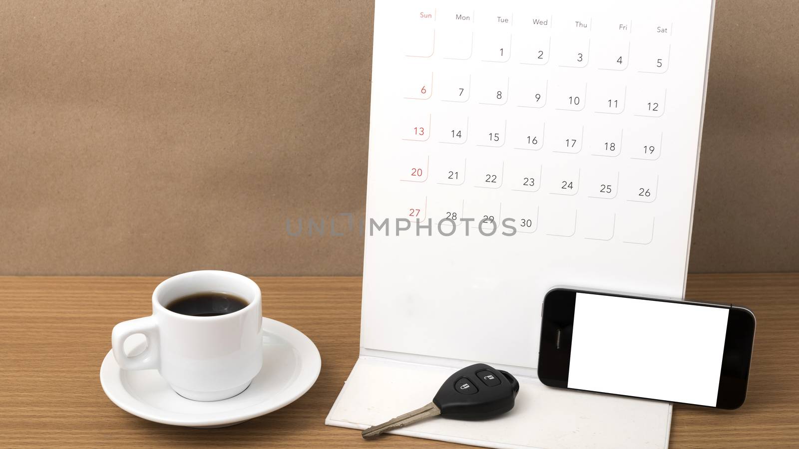 coffee,phone,car key and calendar