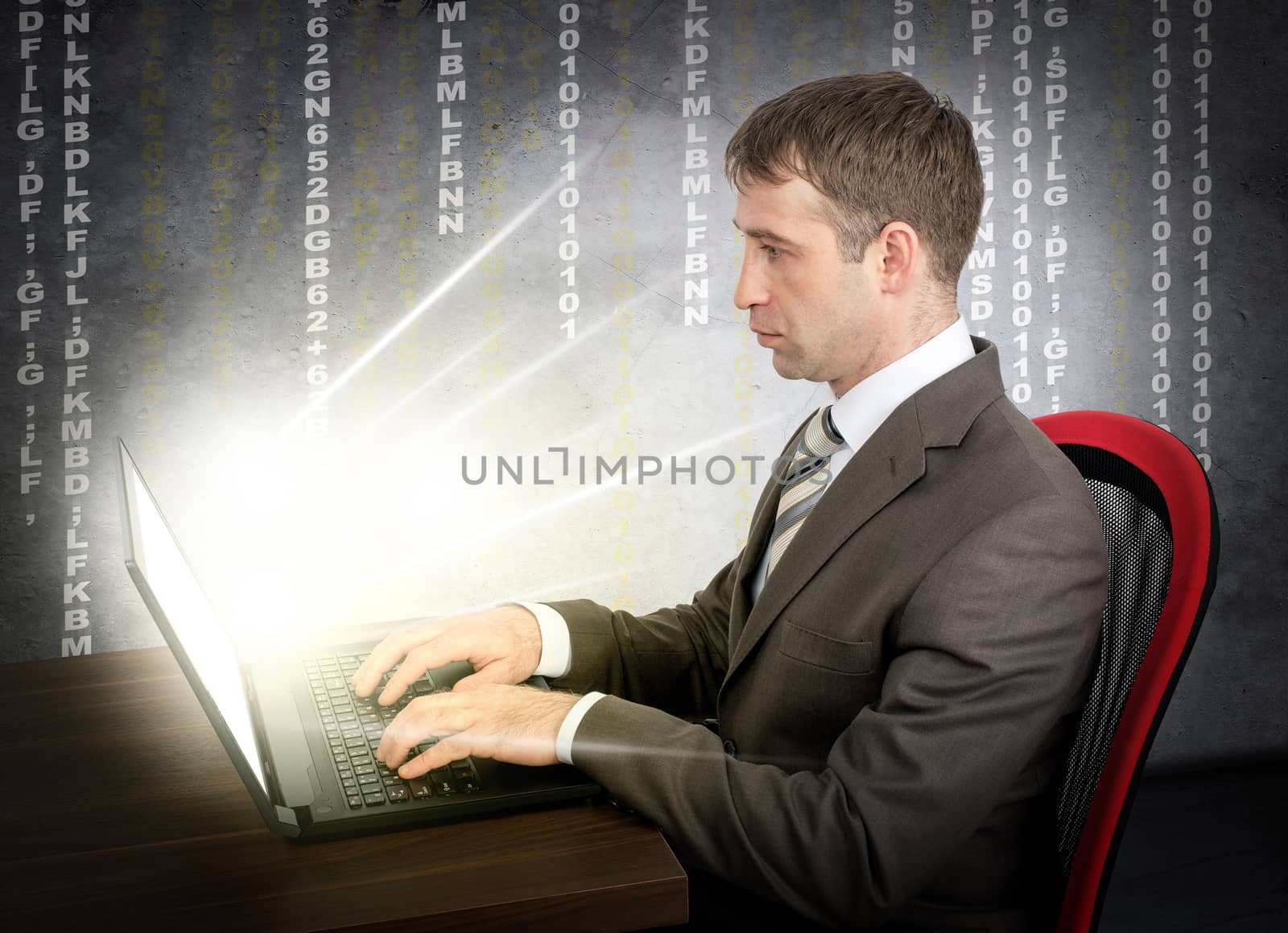 Businessman working on glowing laptop by cherezoff