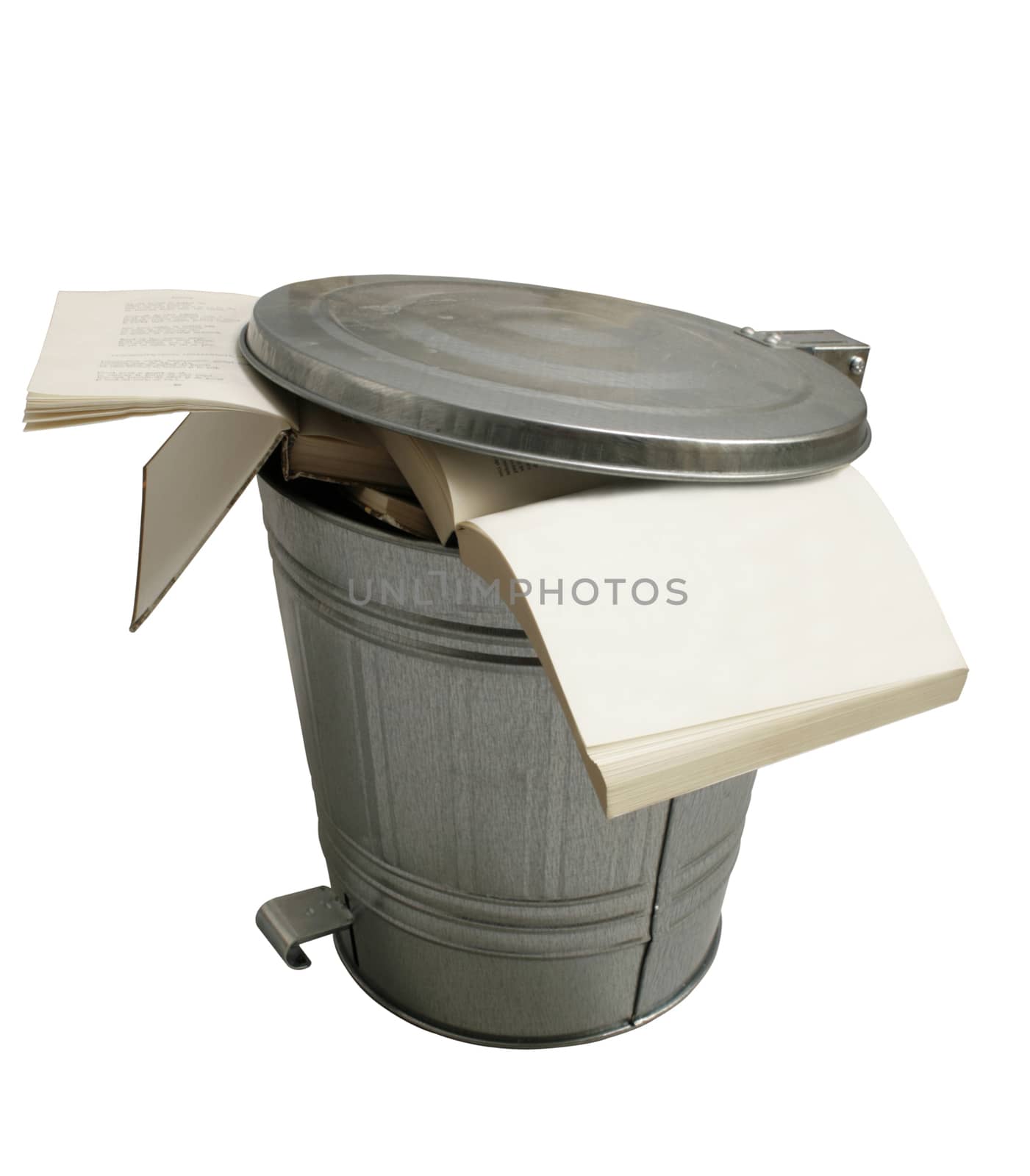 Open books thrown in a metallic trash can isolated on white background