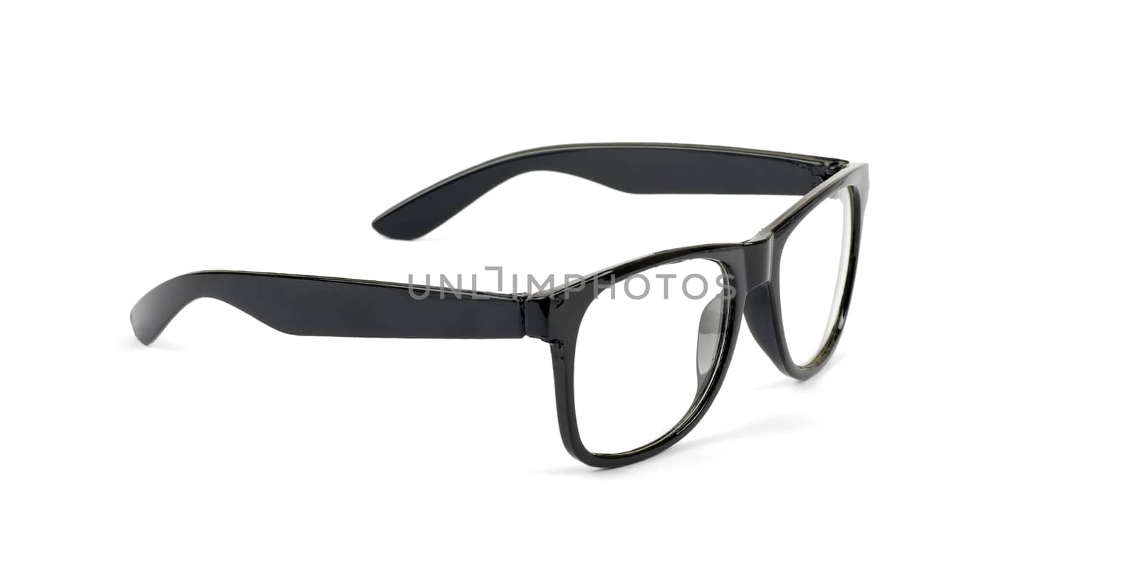 Pair of black eyeglasses isolated on white background, side view