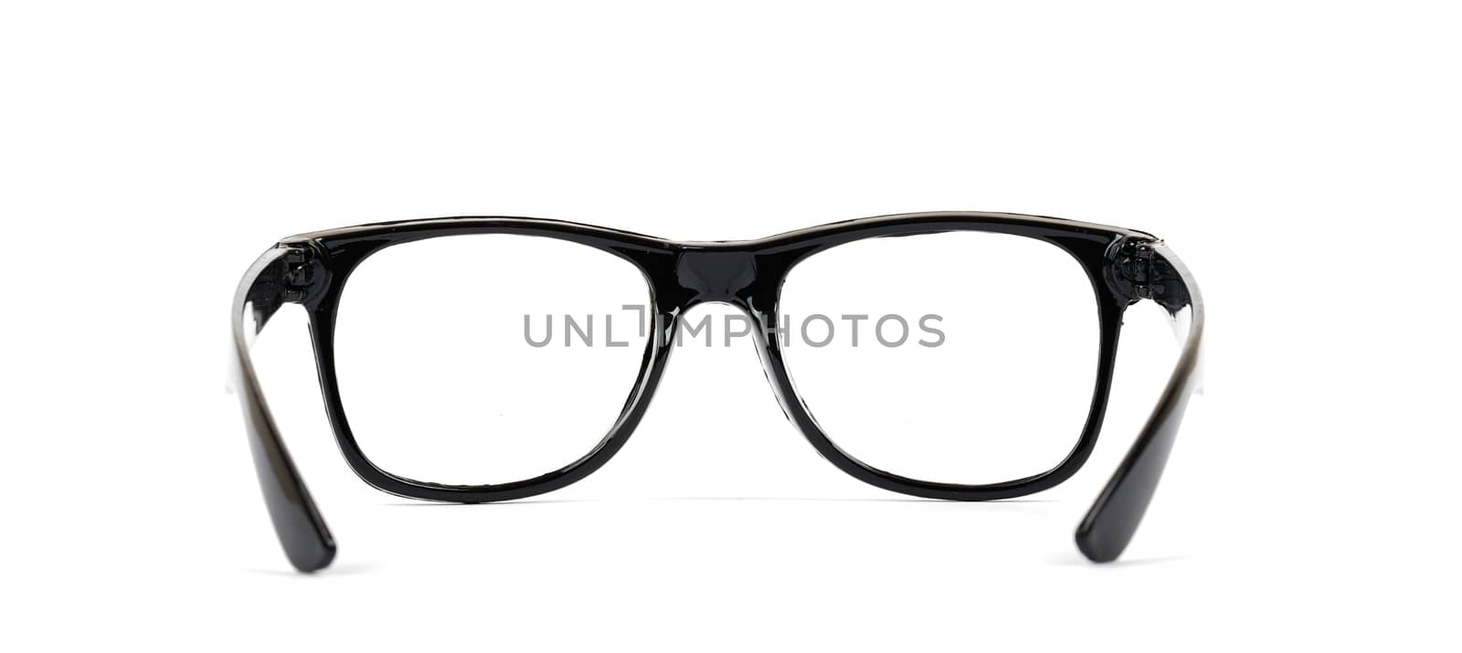 Pair of black eyeglasses isolated on white background, closeup