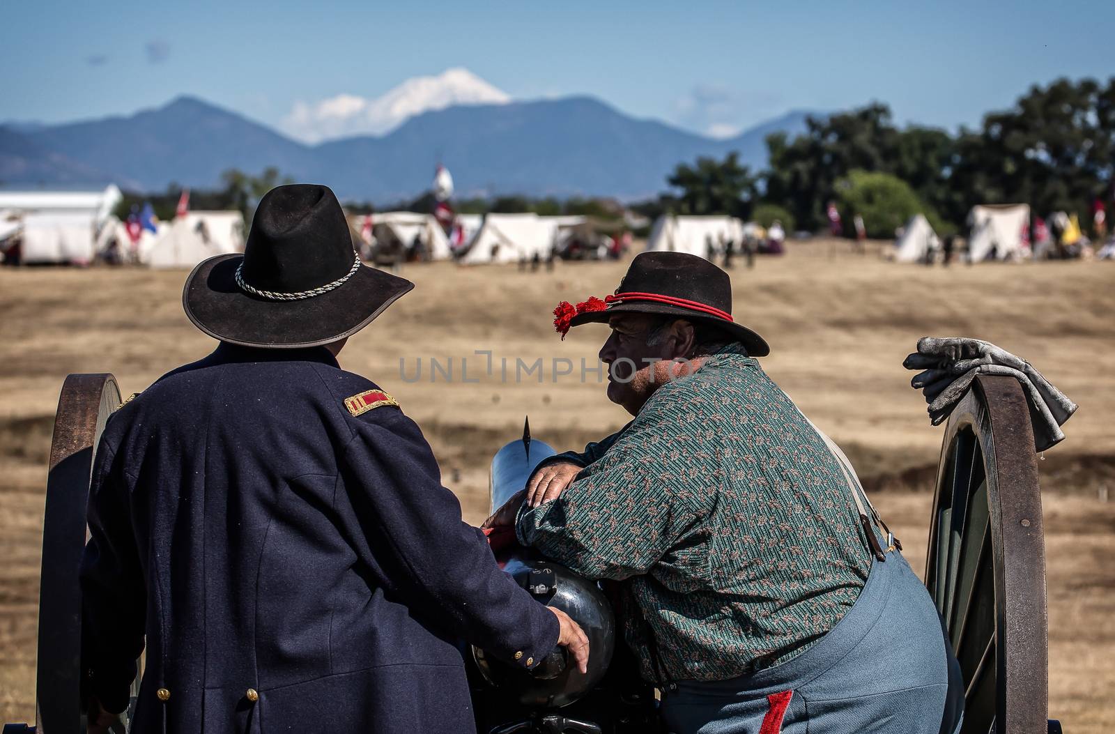 A Union Army cannon crew at a Civil War reenactment in Anderson, California. Mt. Shasta is in the distance.
Photo taken on: September 27th, 2014