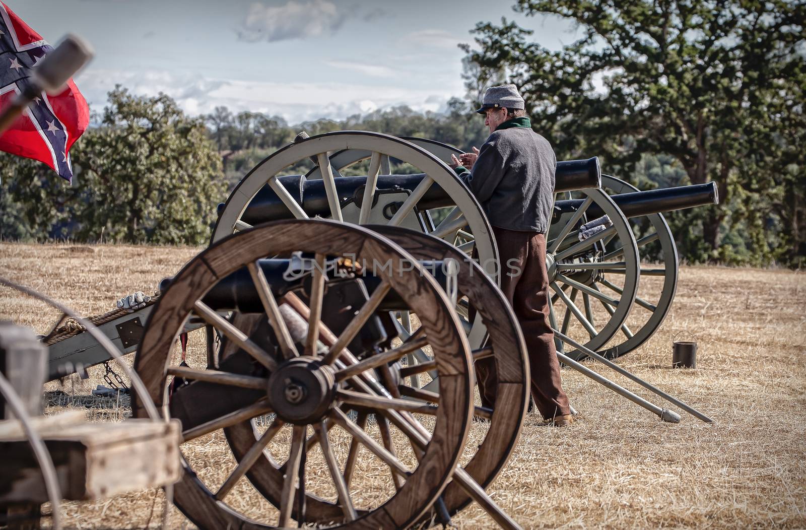 A Confederate Civil War reenactor inspects the artillery battery at the Hawes Farm Civil War Reenactment in Anderson, California. Photo taken September 27, 2014.